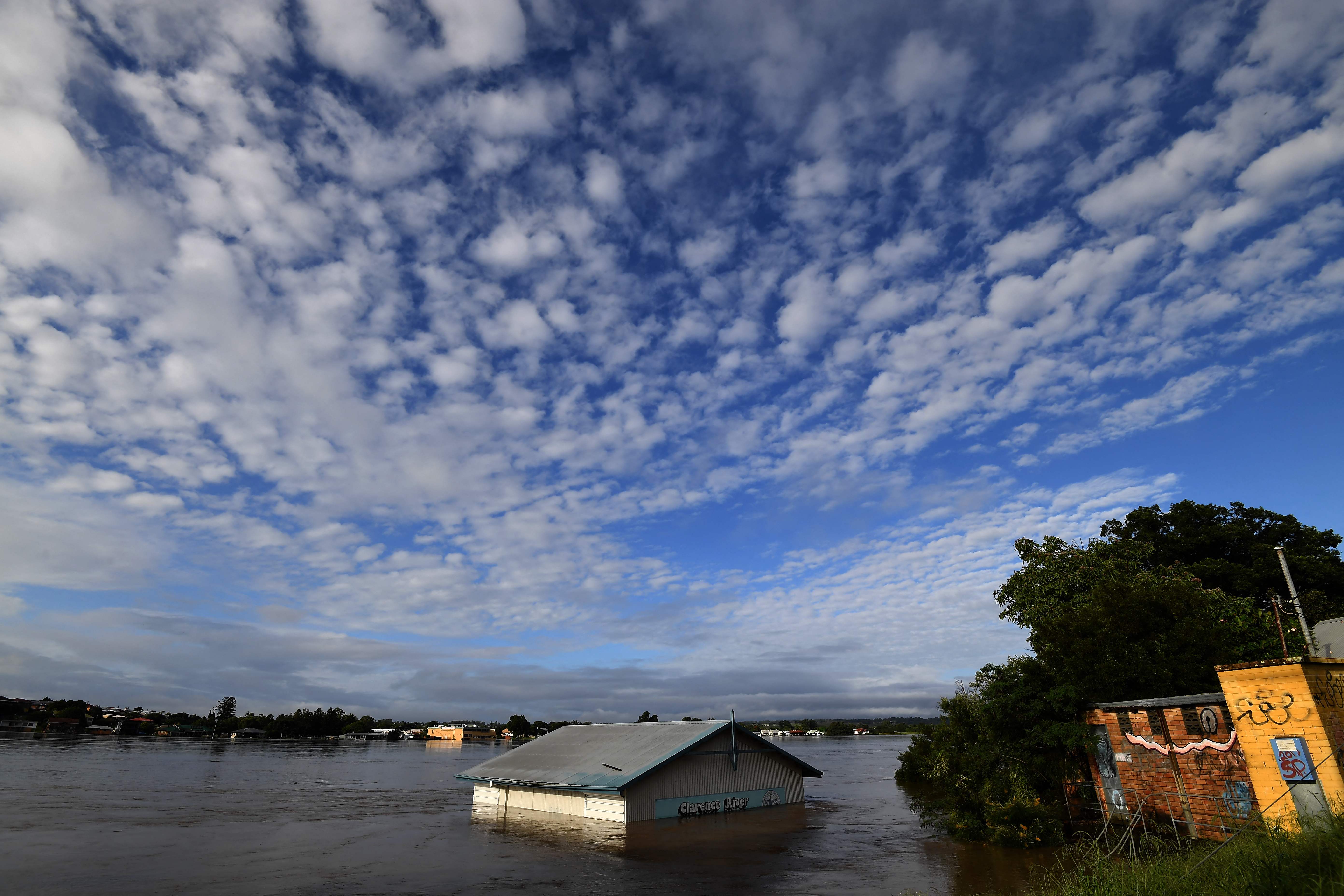 A submerged shed is seen on the bank of the overflowing Clarence River in Grafton, some 130 kms from the New South Wales town Lismore on 1 March