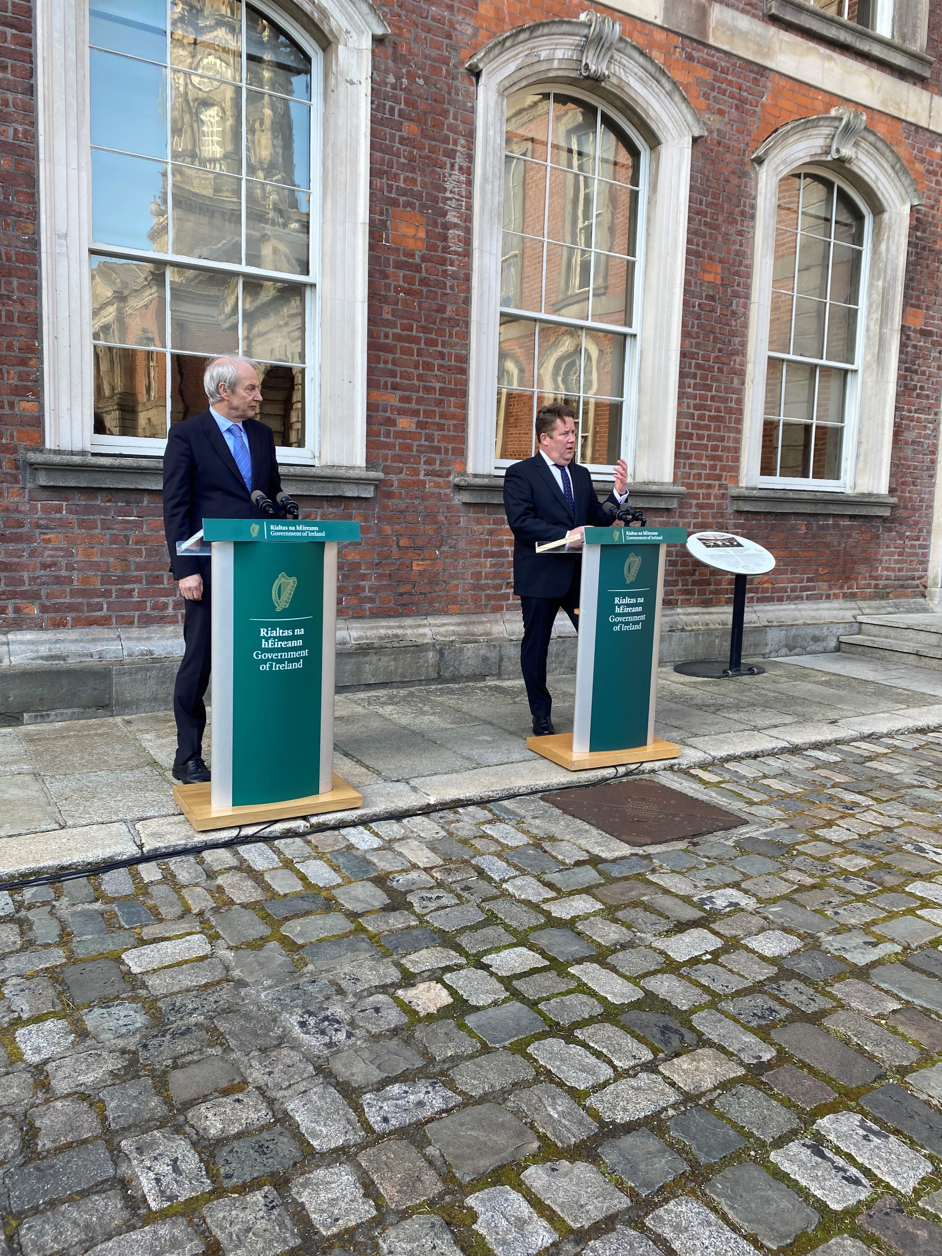 Minister for Housing Darragh O’Brien and chairman of the Housing Commission John O’Connor speaking at Dublin Castle (Cate McCurry/PA)