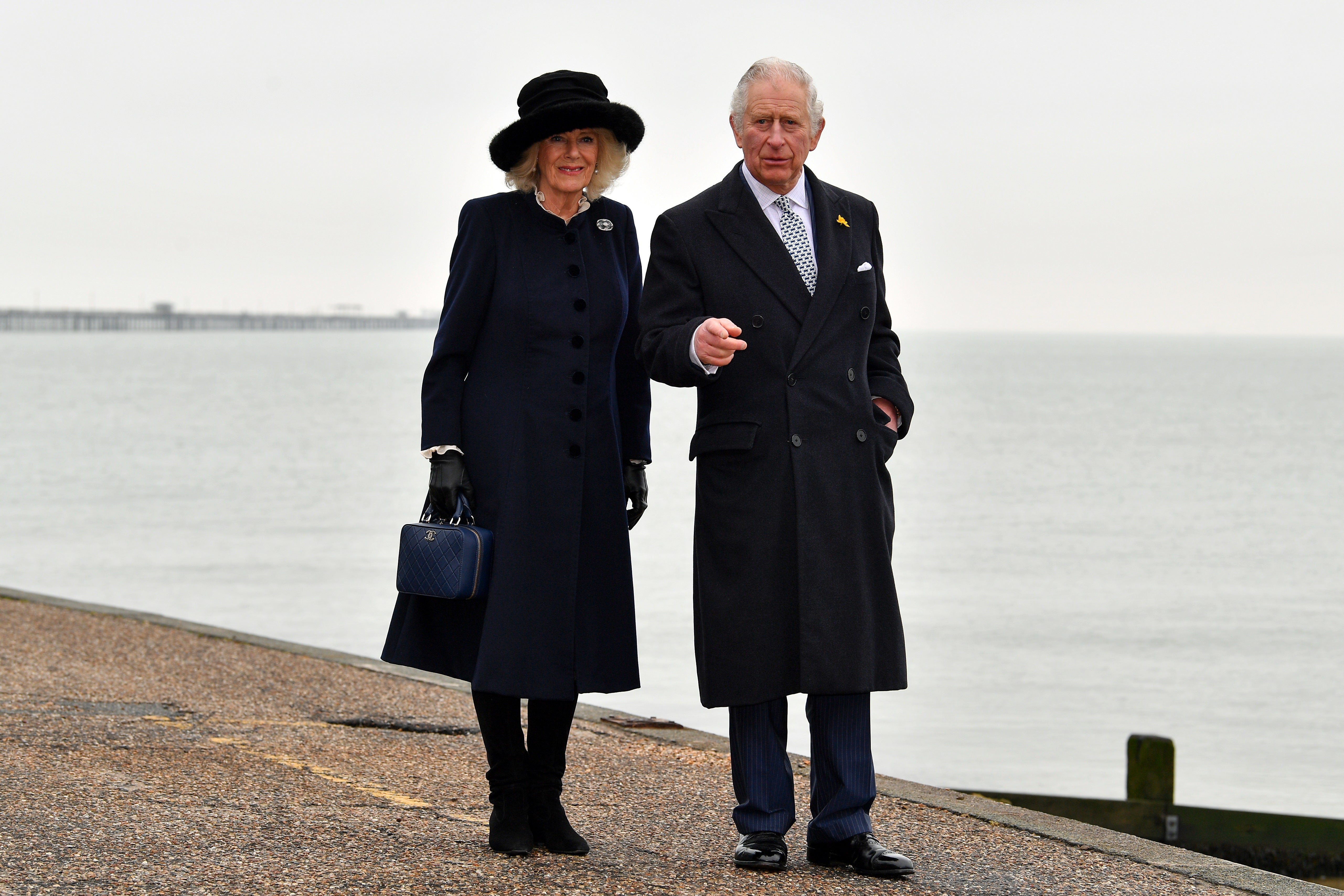 The Prince of Wales and Duchess of Cornwall pose for pictures during a visit to the seafront at Southend-on-Sea in Essex (Justin Tallis/PA)