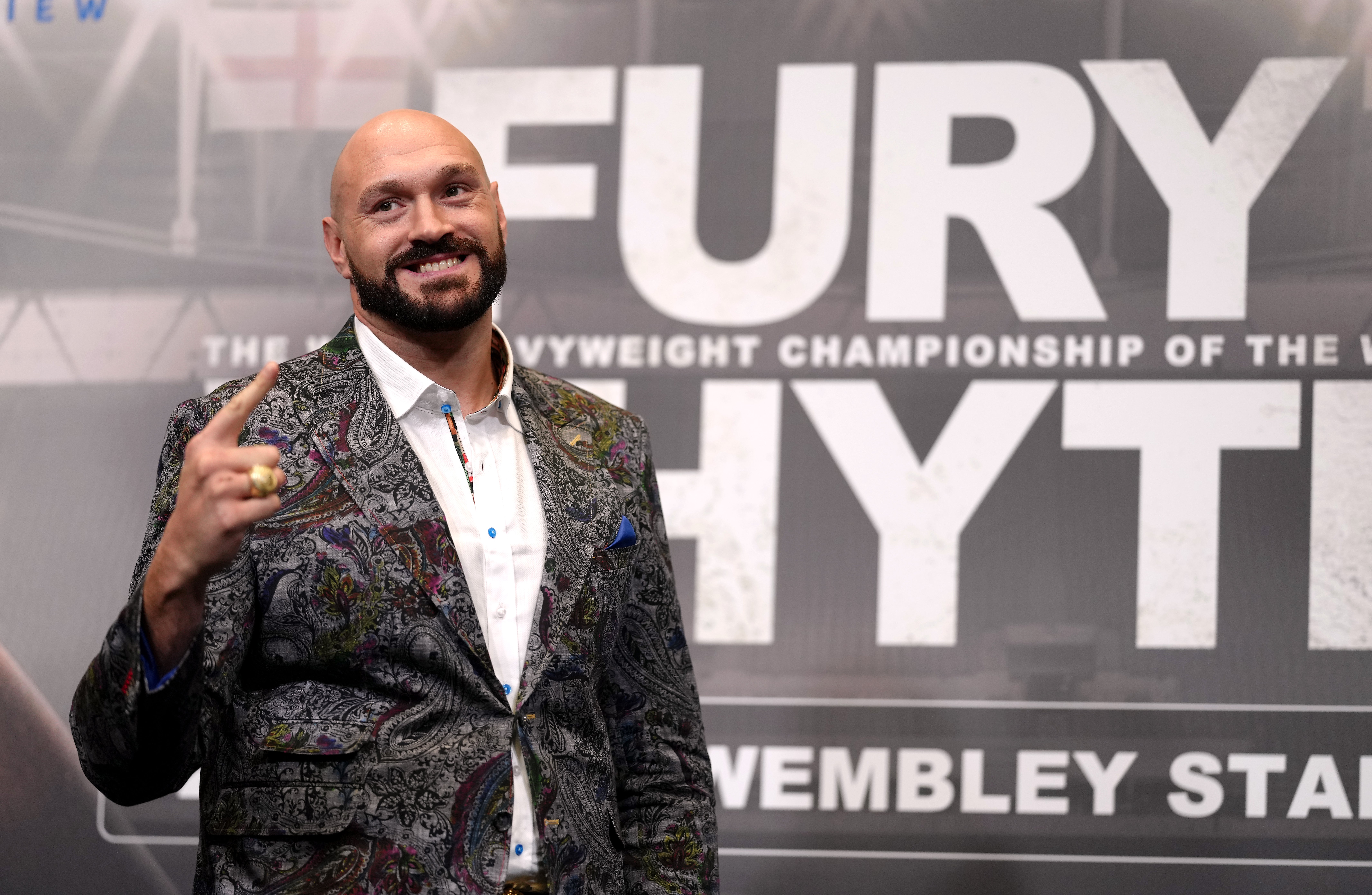 Tyson Fury was not going to let absent ‘friends’ take the shine off his latest moment in the spotlight (John Walton/PA)