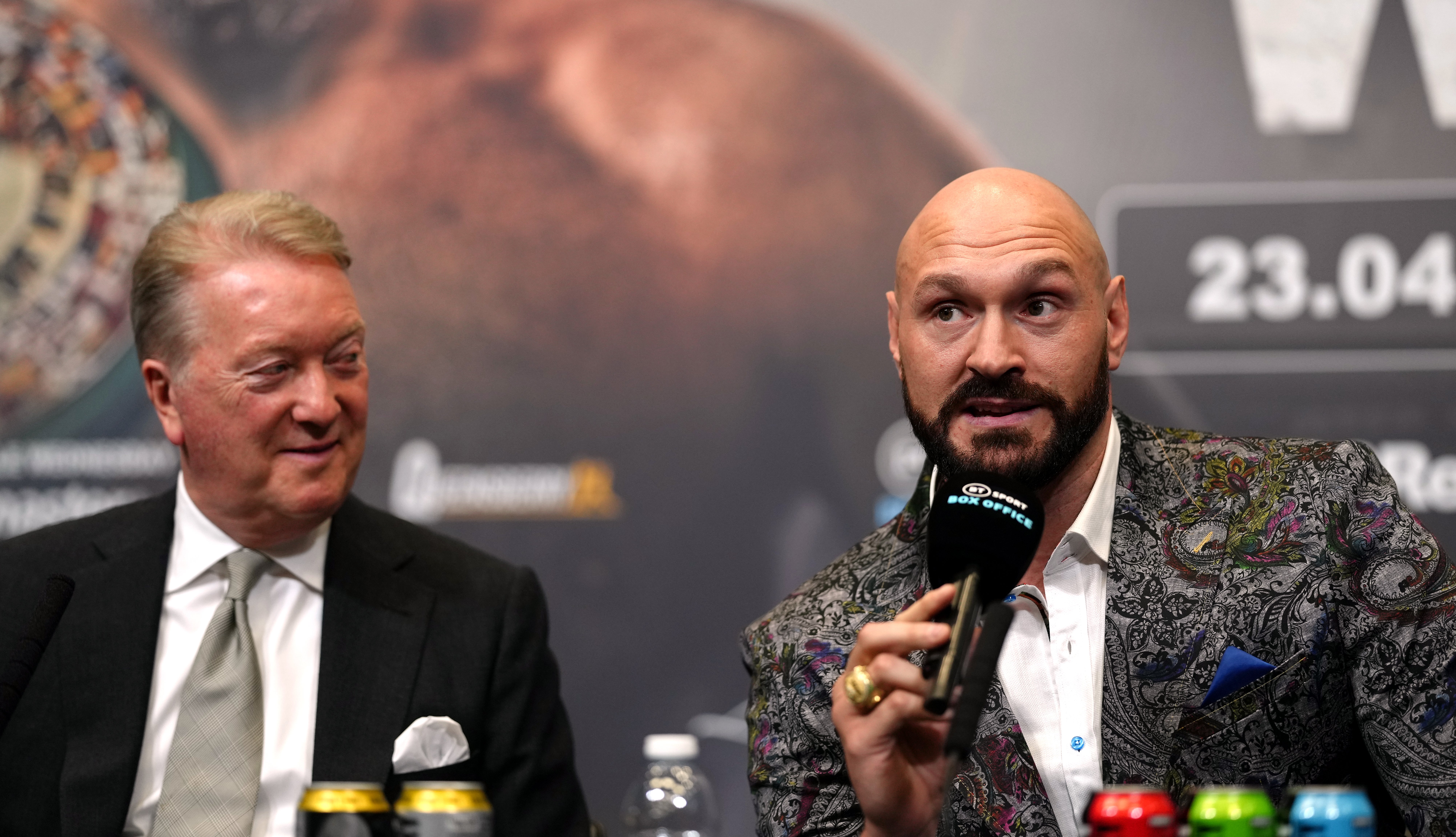 Frank Warren, left, won the purse bids for this fight (John Walton/PA)