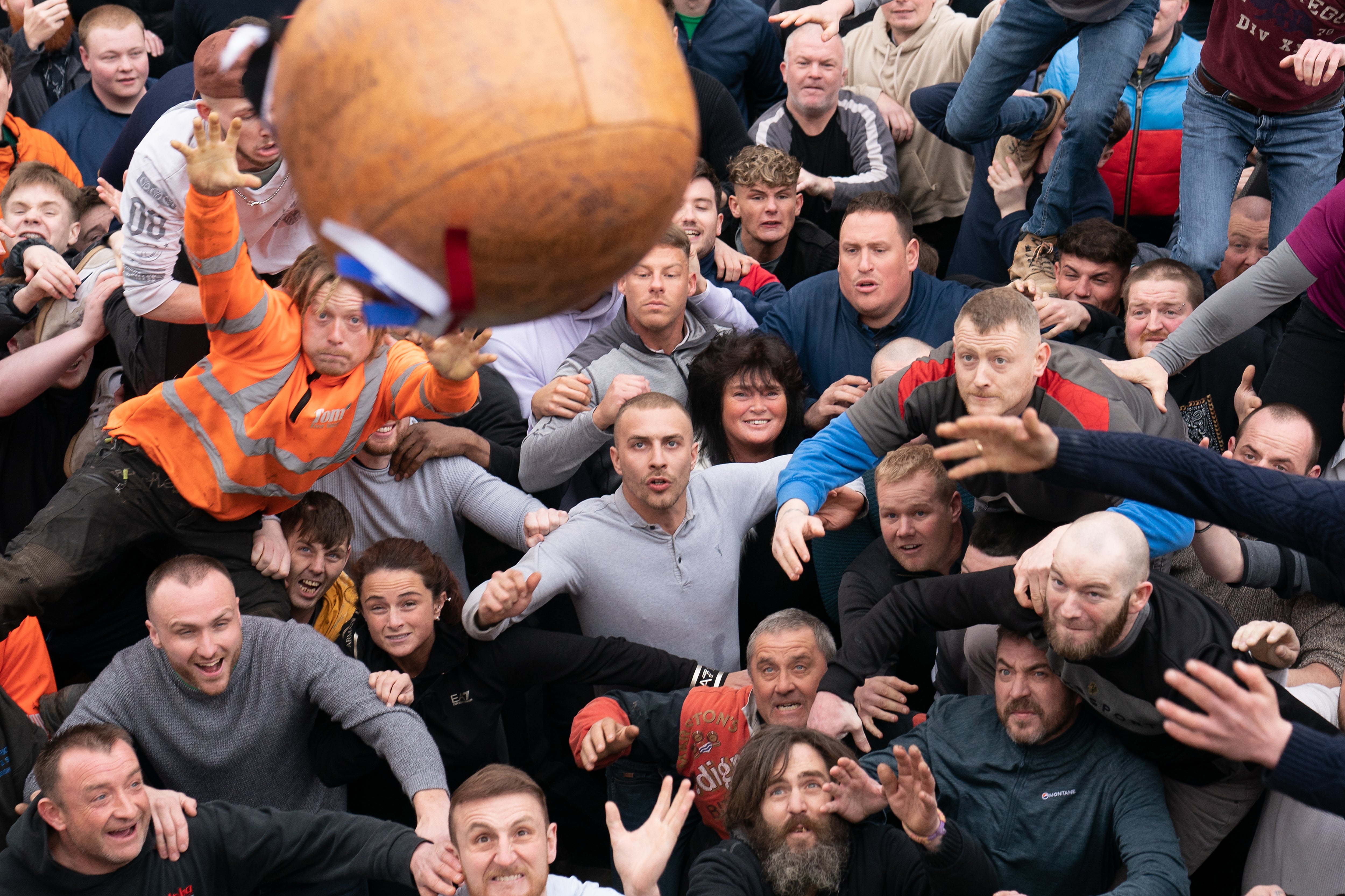 Players take part in the Atherstone Ball Game in Warwickshire (Joe Giddens/PA)