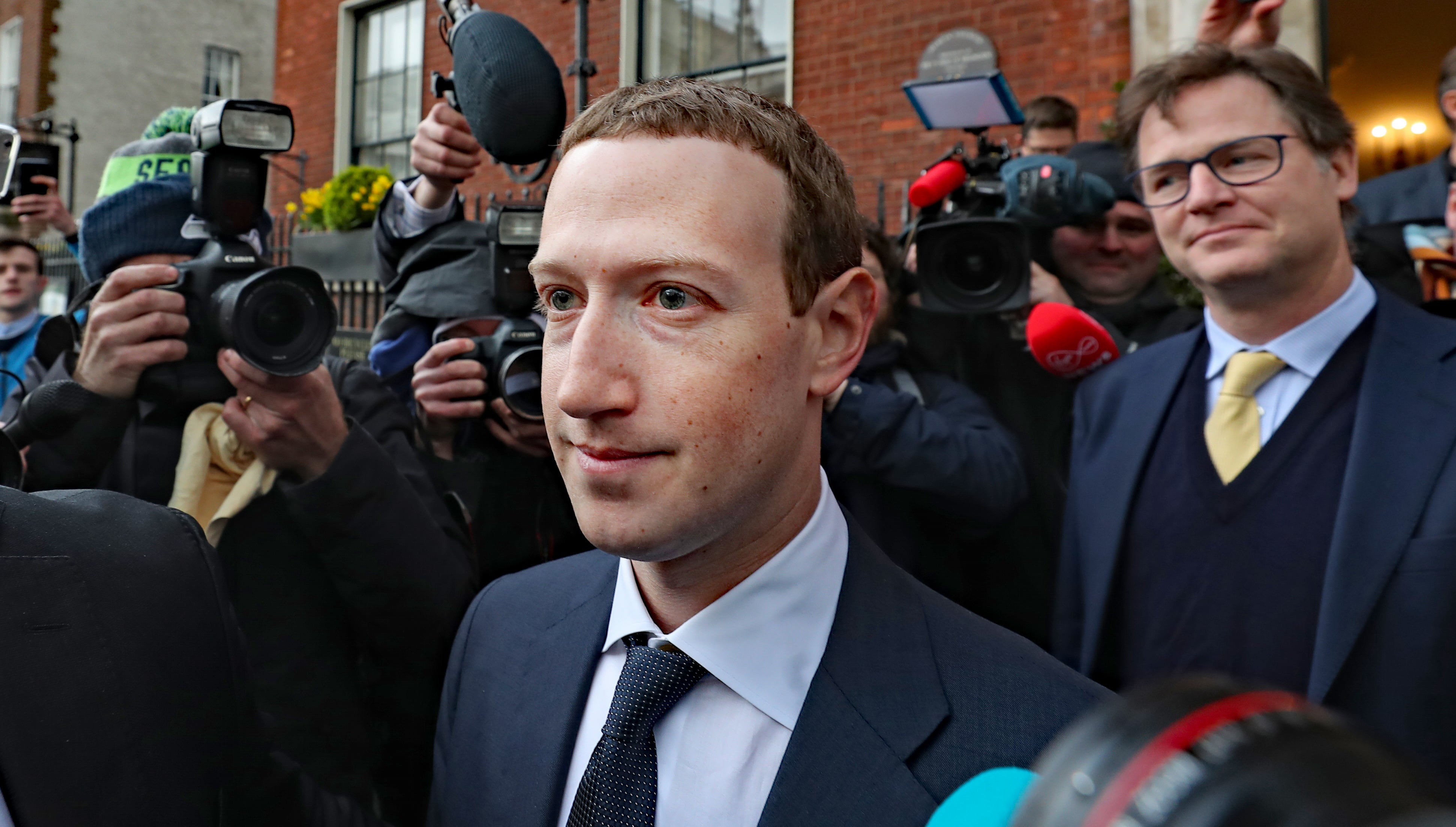Facebook CEO Mark Zuckerberg leaving The Merrion Hotel in Dublin with as its head of global policy and communications Nick Clegg after a meeting with politicians to discuss regulation of social media and harmful content.