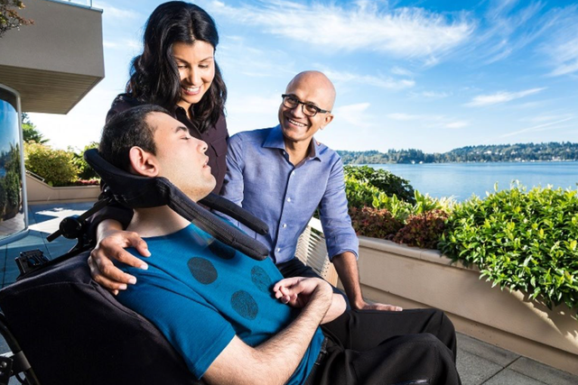 <p>Microsoft CEO Satya Nadella, right, with son Zain and his wife Anu</p>