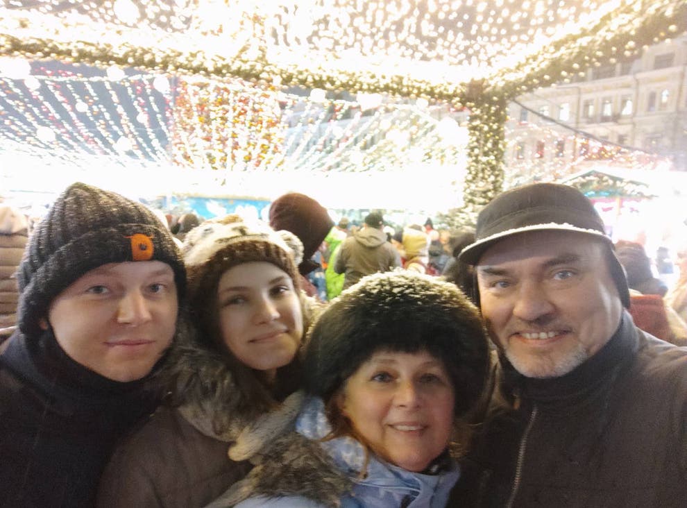 Mr Zharikov (left) with his sister, who has fled Ukraine, and parents, who remain in the country