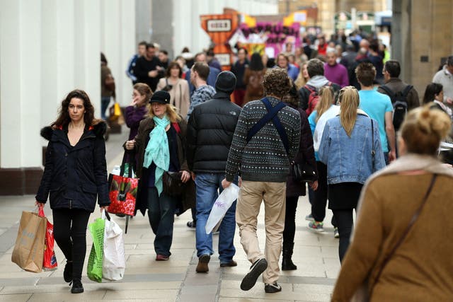 Shoppers, like these in Cambridge, face rising prices (Chris Radburn/PA)
