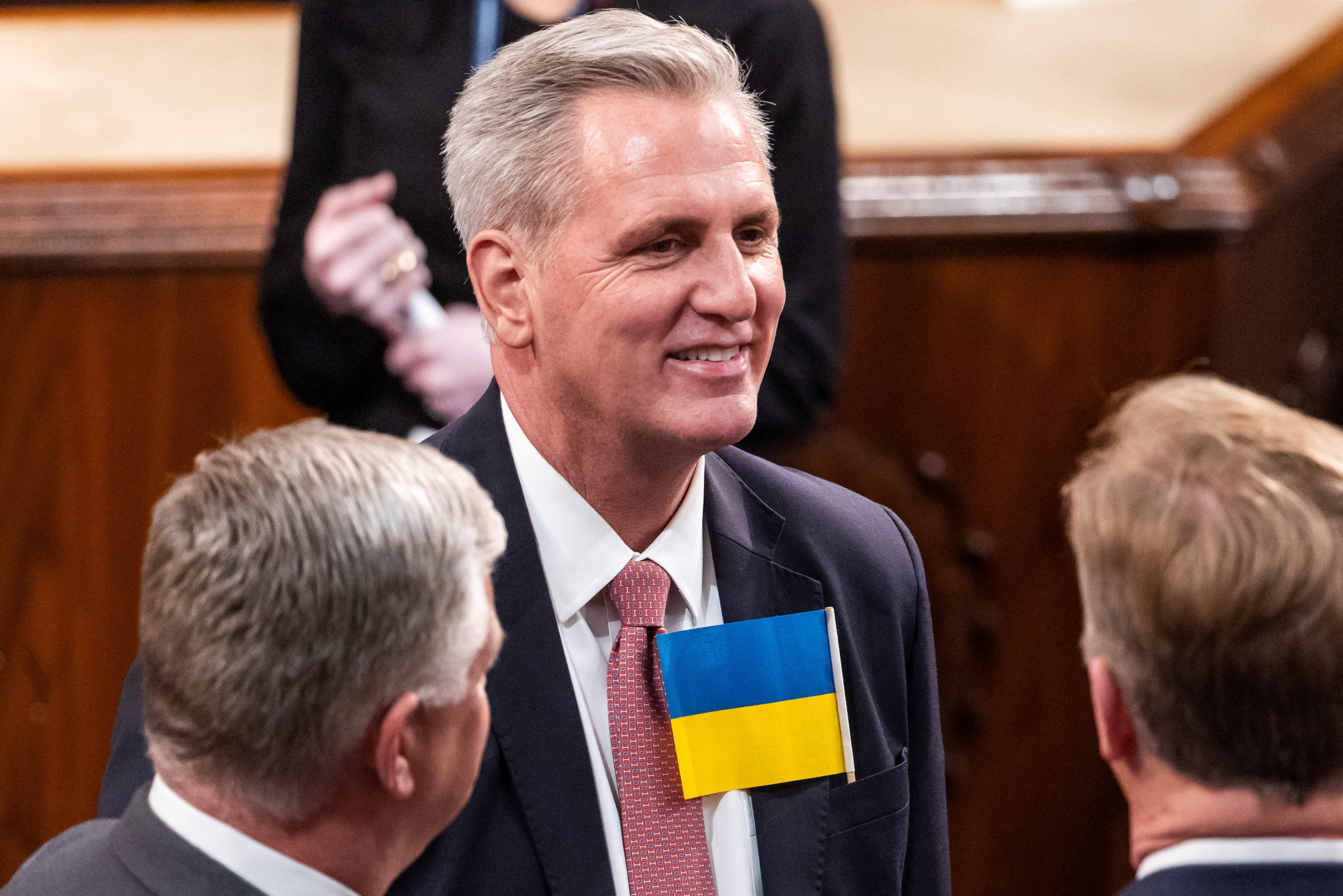 Republican House Minority Leader Kevin McCarthy (R-CA) wears a Ukrainian flag to US President Joe Biden's State of the Union Address in the US Capitol in Washington, DC, U.S., March 1, 2022