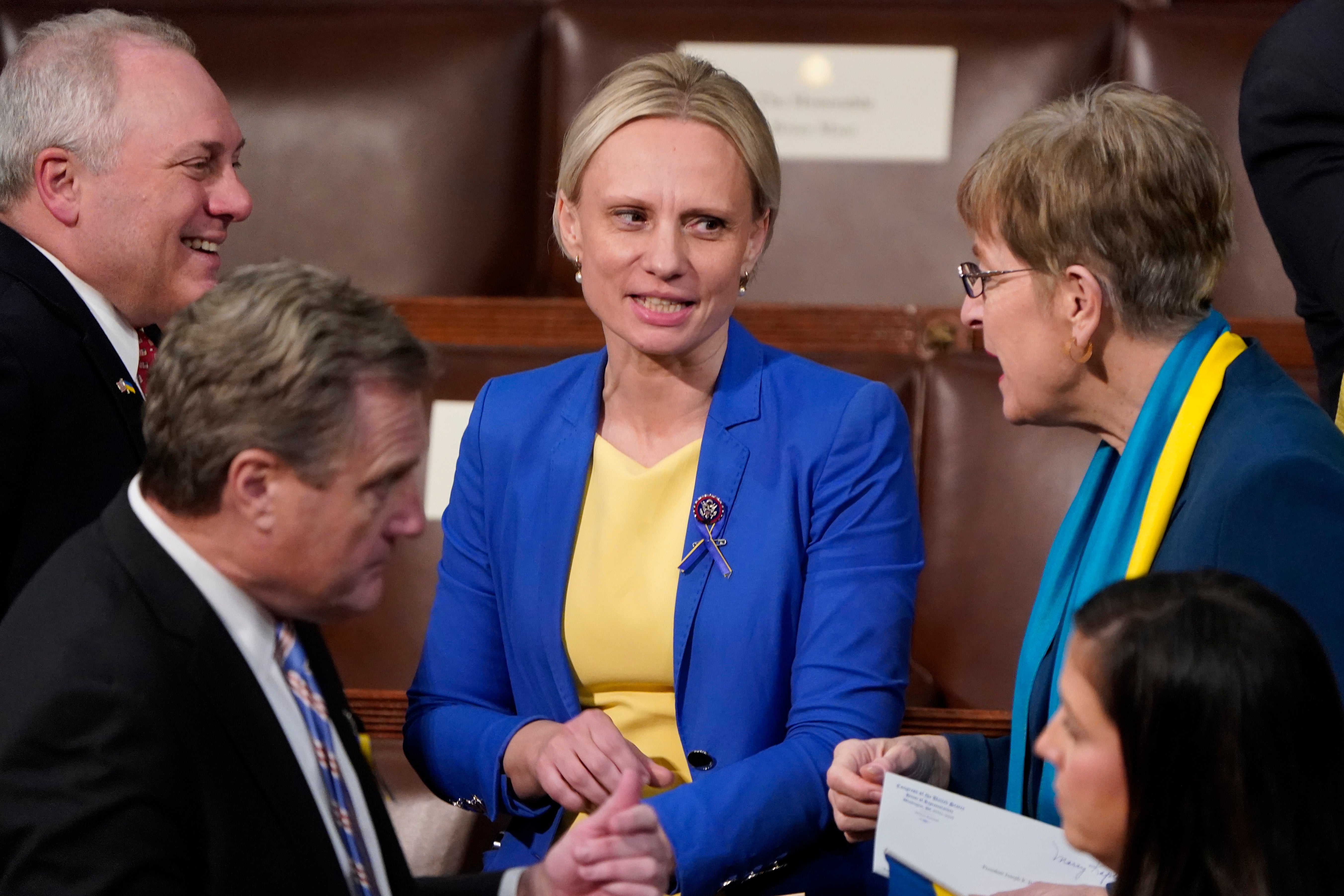 Rep. Steve Scalise, R-La., left, and Rep. Marcy Kaptur, D-Ohio, right, talk with Ukrainian-born American Rep. Victoria Spartz, R-Ind., before President Joe Biden delivers his first State of the Union address to a joint session of Congress, at the Capitol in Washington, Tuesday, March 1, 2022