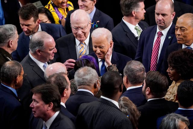 <p>President Joe Biden is greeted by Democrats after delivering his address to the joint session of Congress </p>