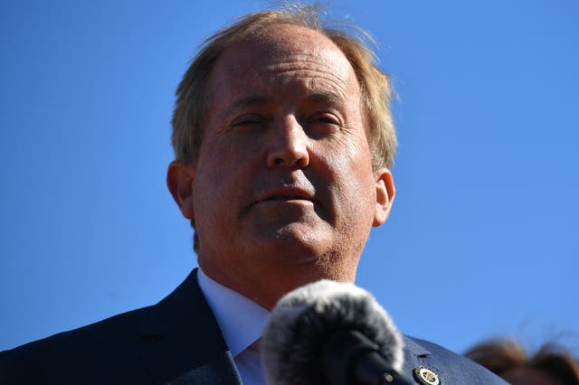 <p>Texas Attorney General Ken Paxton speaks outside of the US Supreme Court in Washington, DC on 1 November 2021</p>