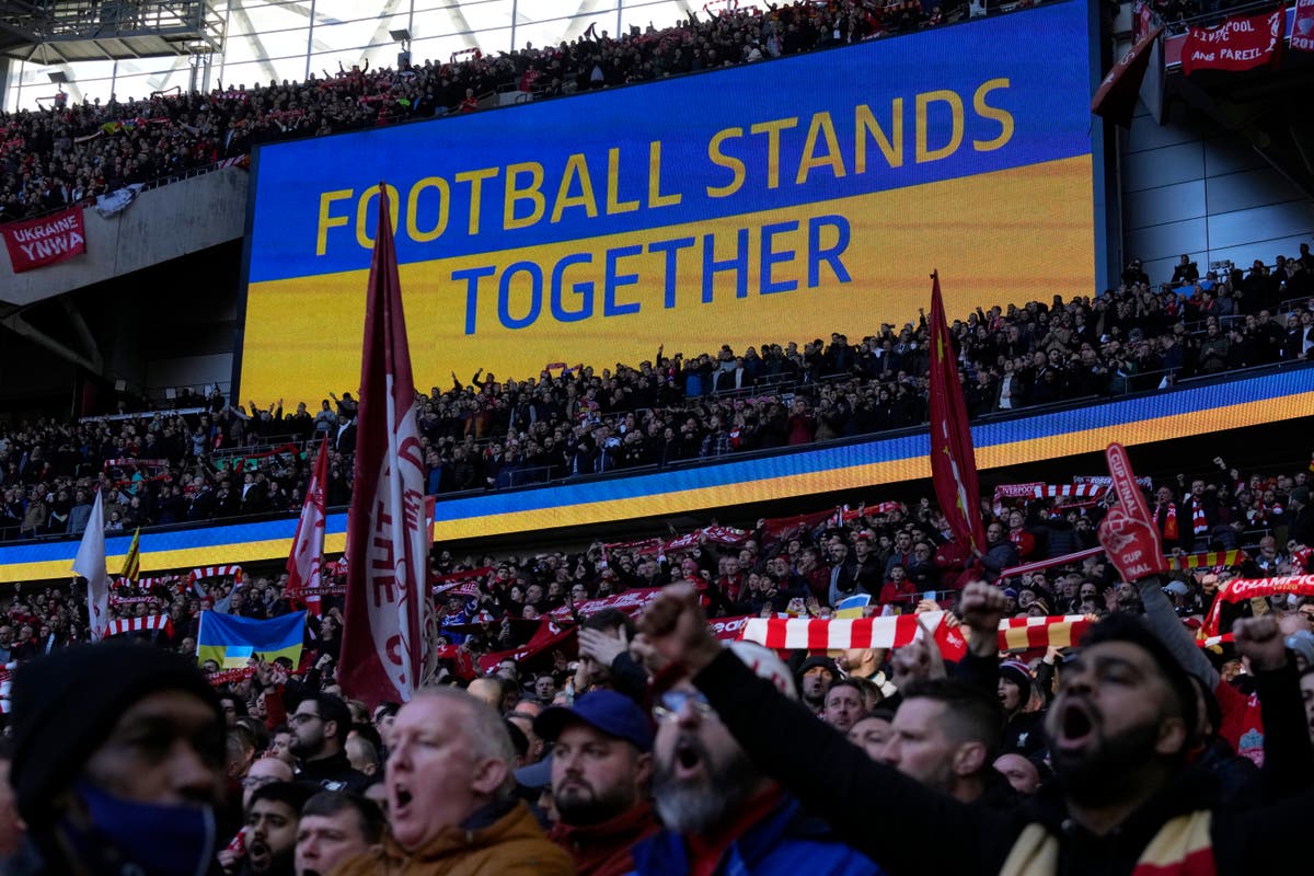 AP PHOTOS: Sports world lets Ukrainian colors fly