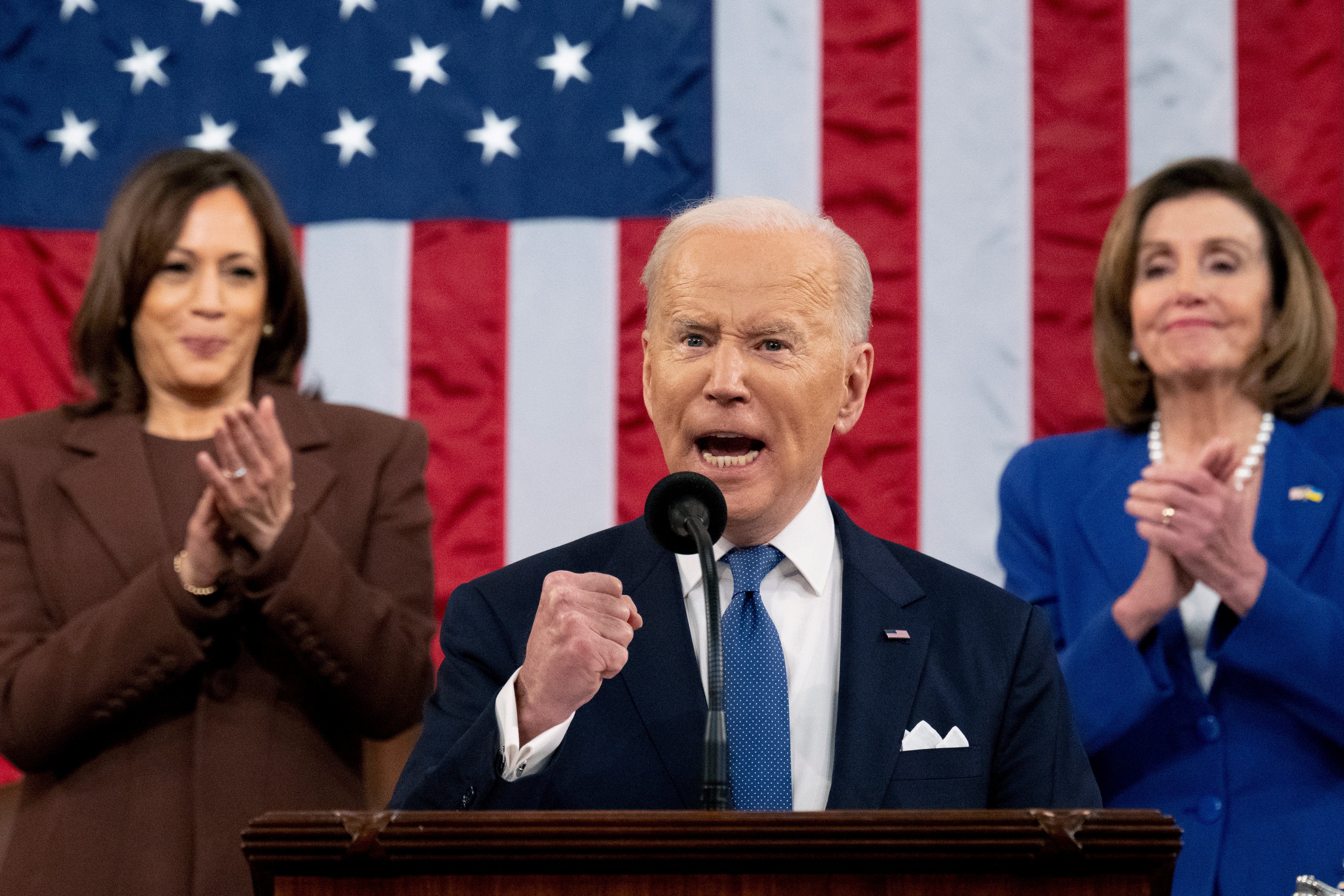 President Joe Biden delivers his first State of the Union address to a joint session of Congress at the Capitol, as Vice President Kamala Harris and House Speaker Nancy Pelosi of Calif., watch, Tuesday, March 1, 2022, in Washington.