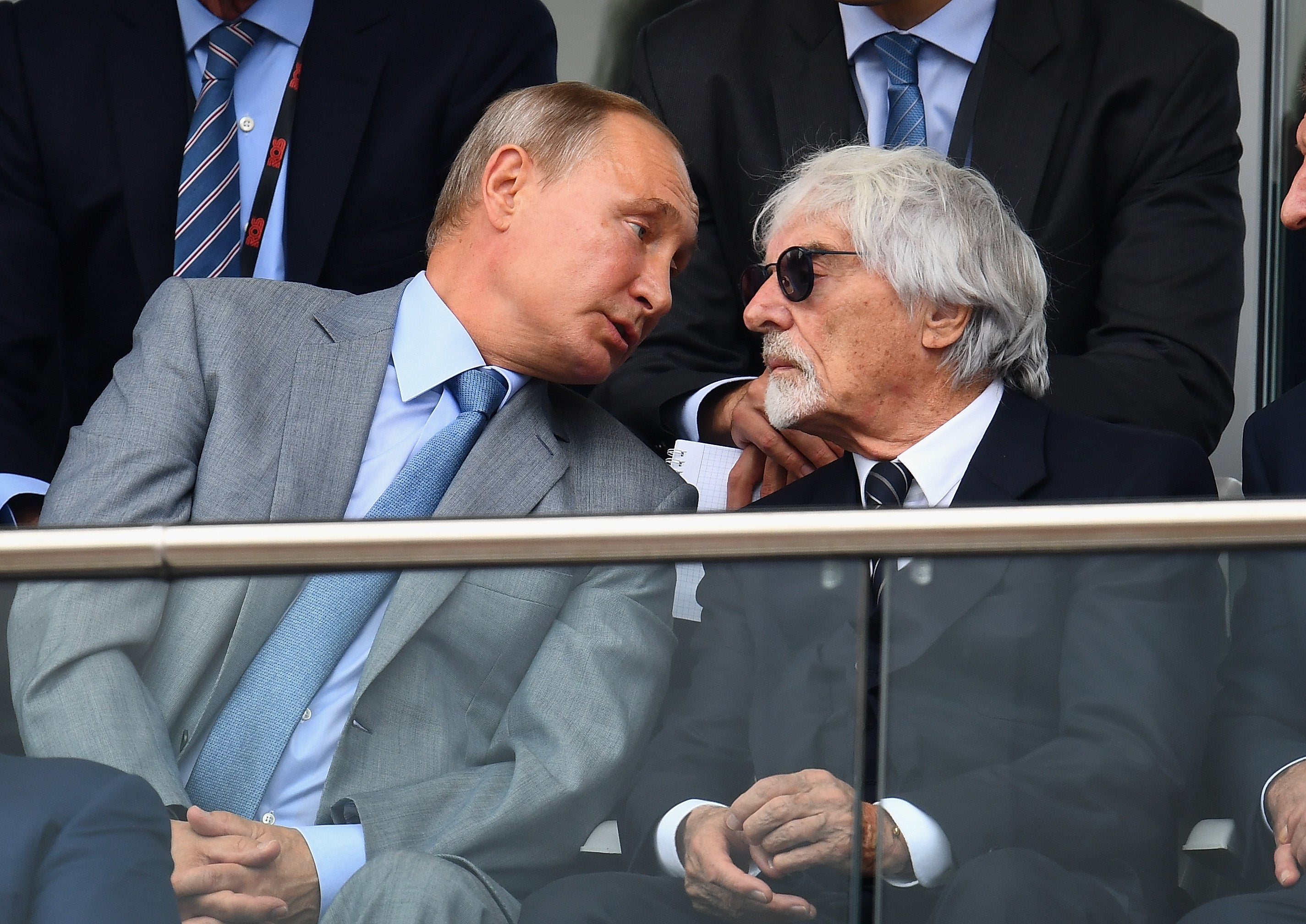 Putin and Ecclestone talk during the Russian Grand Prix in 2018