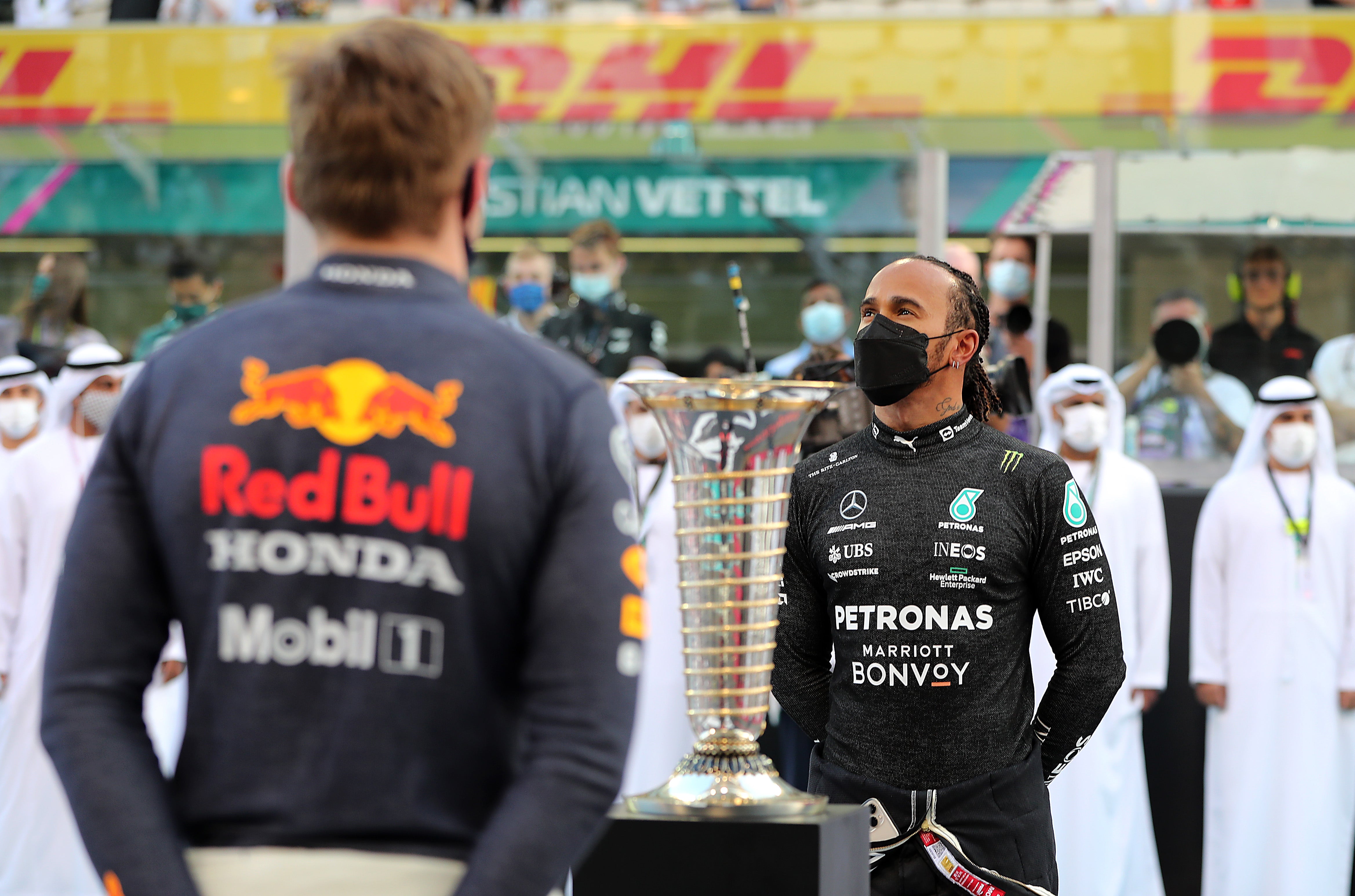 Lewis Hamilton (right) was denied a record eighth world title by Max Verstappen in 2021