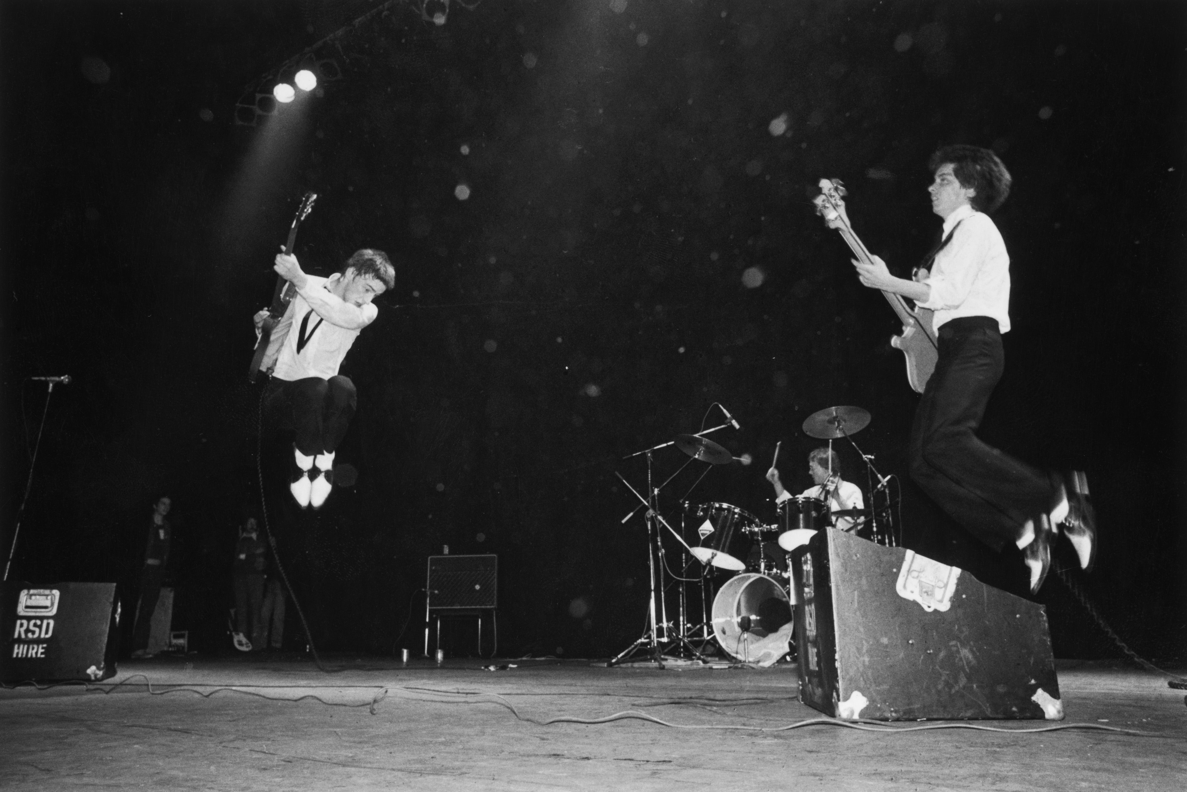 Paul Weller, Rick Buckler and Bruce Foxton on stage at the Rainbow Theatre, London, in 1977