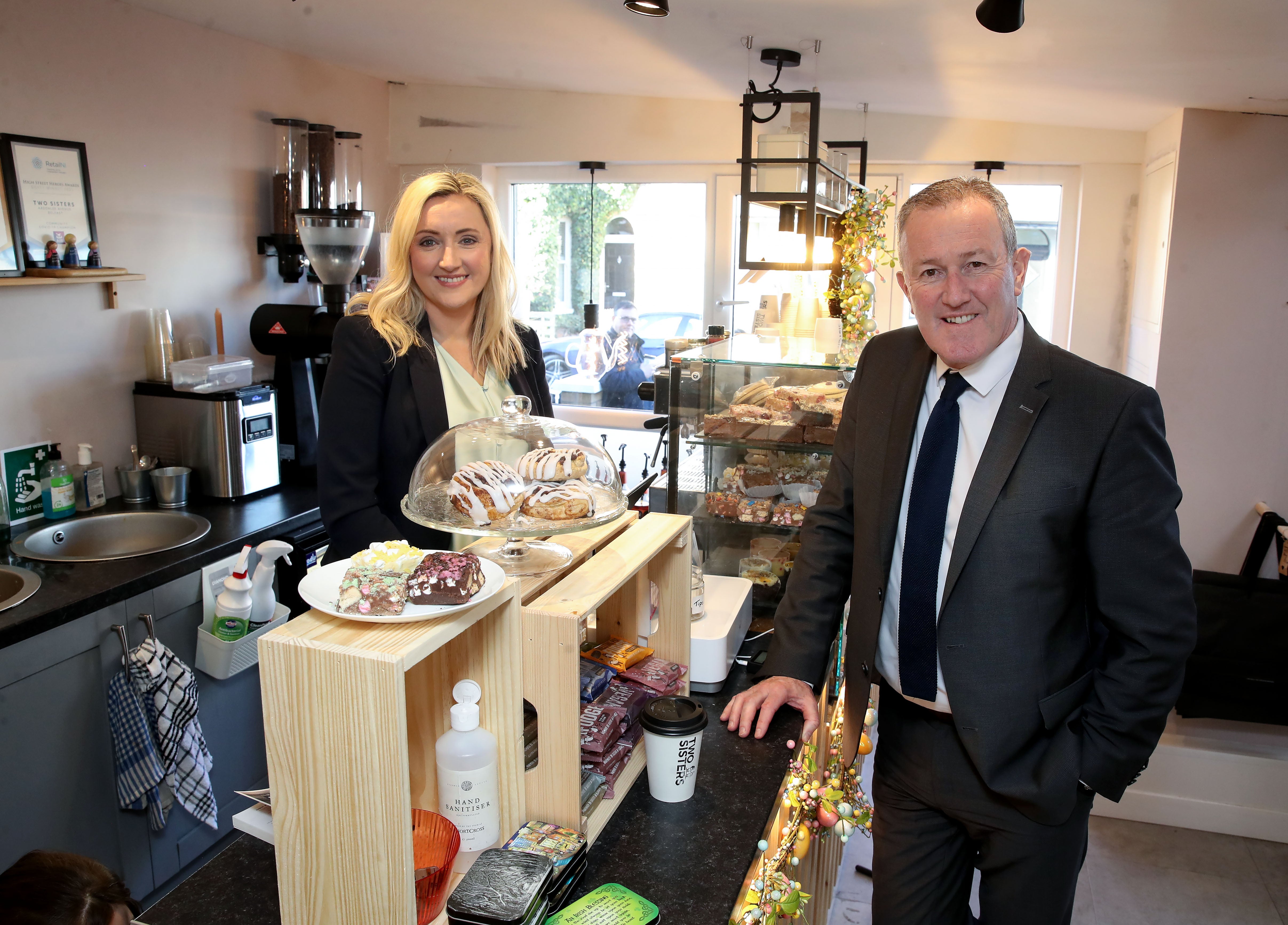 Finance Minister Conor Murphywith Two Sisters store owner Victoria Nicol (William Cherry/Presseye/PA)
