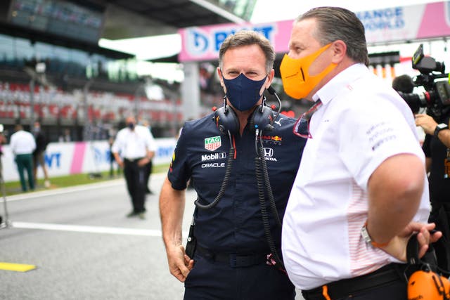<p>McLaren chief executive  Zak Brown (right) has questioned Red Bull’s approach </p>