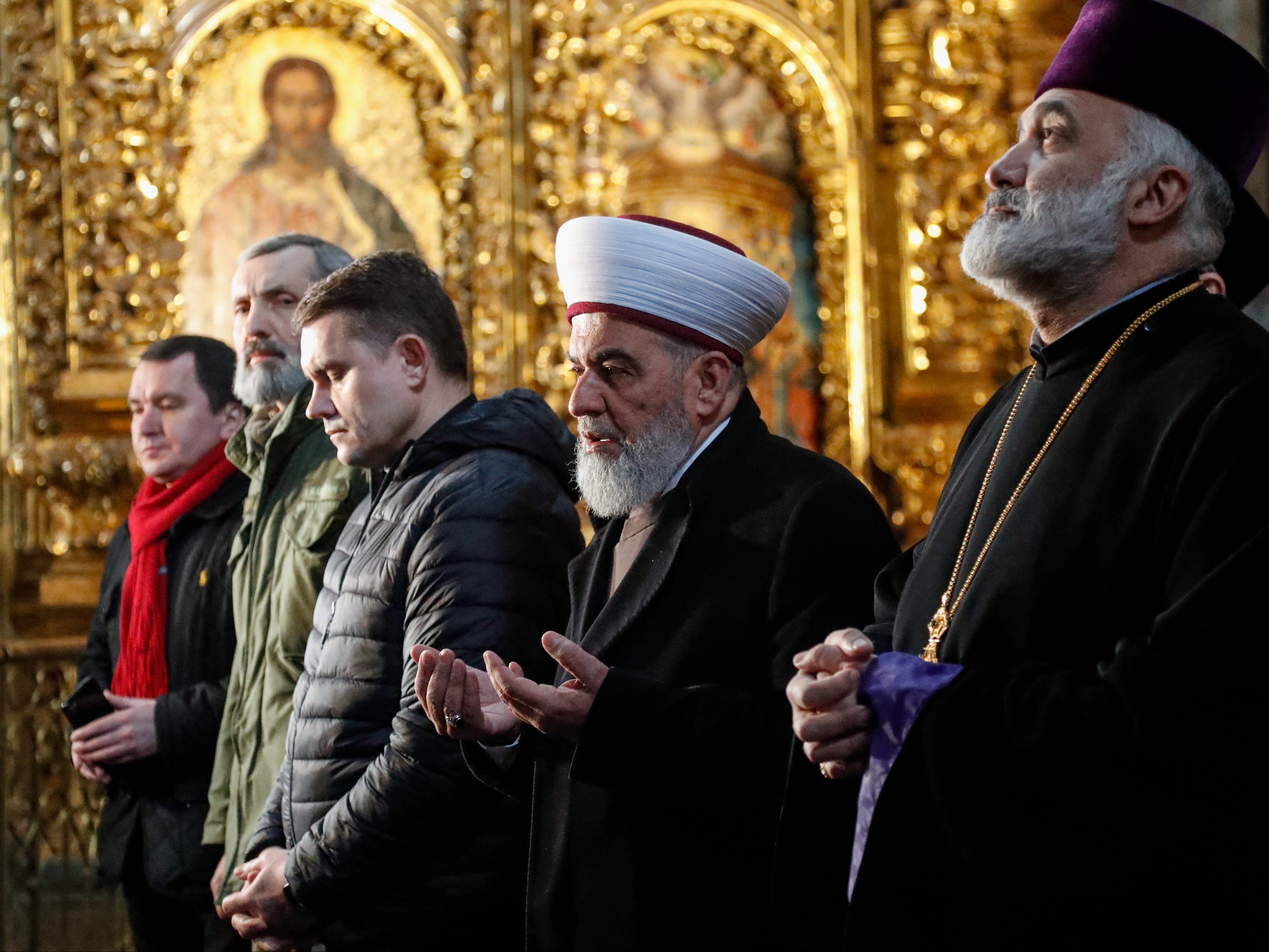 Prayers in the ancient St Sophia Cathedral in Kyiv