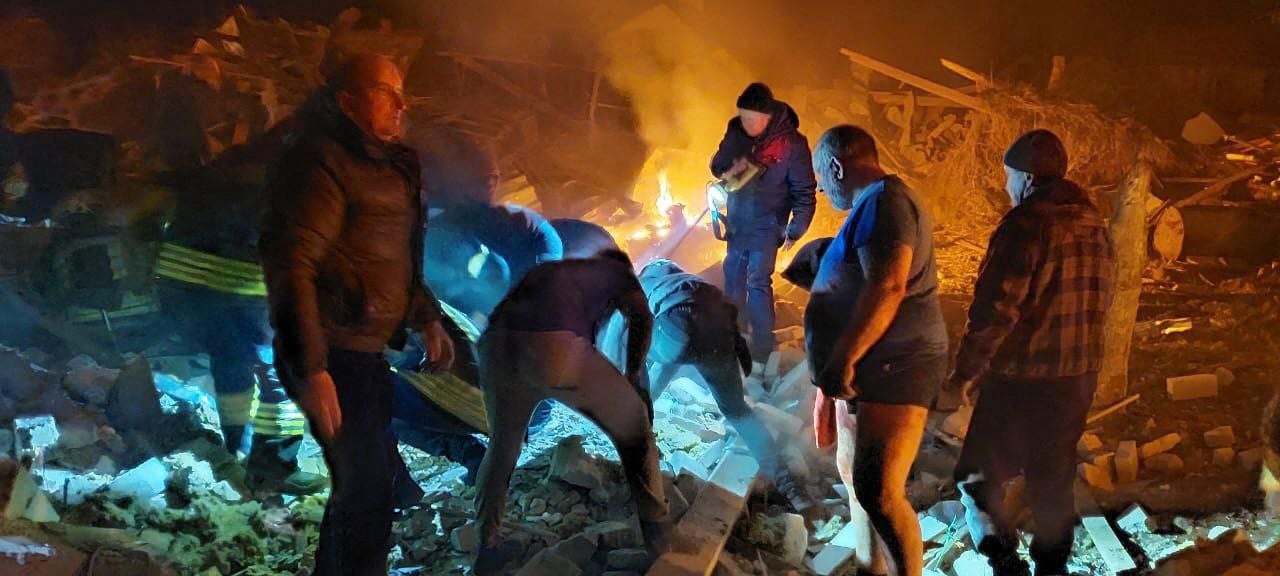 Rescuers working among the rubble of private houses in Zhytomy