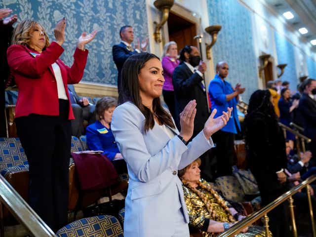 <p>U.S. Rep. Alexandria Ocasio-Cortez (D-NY) claps as U.S. President Joe Biden delivers the State of the Union address</p>