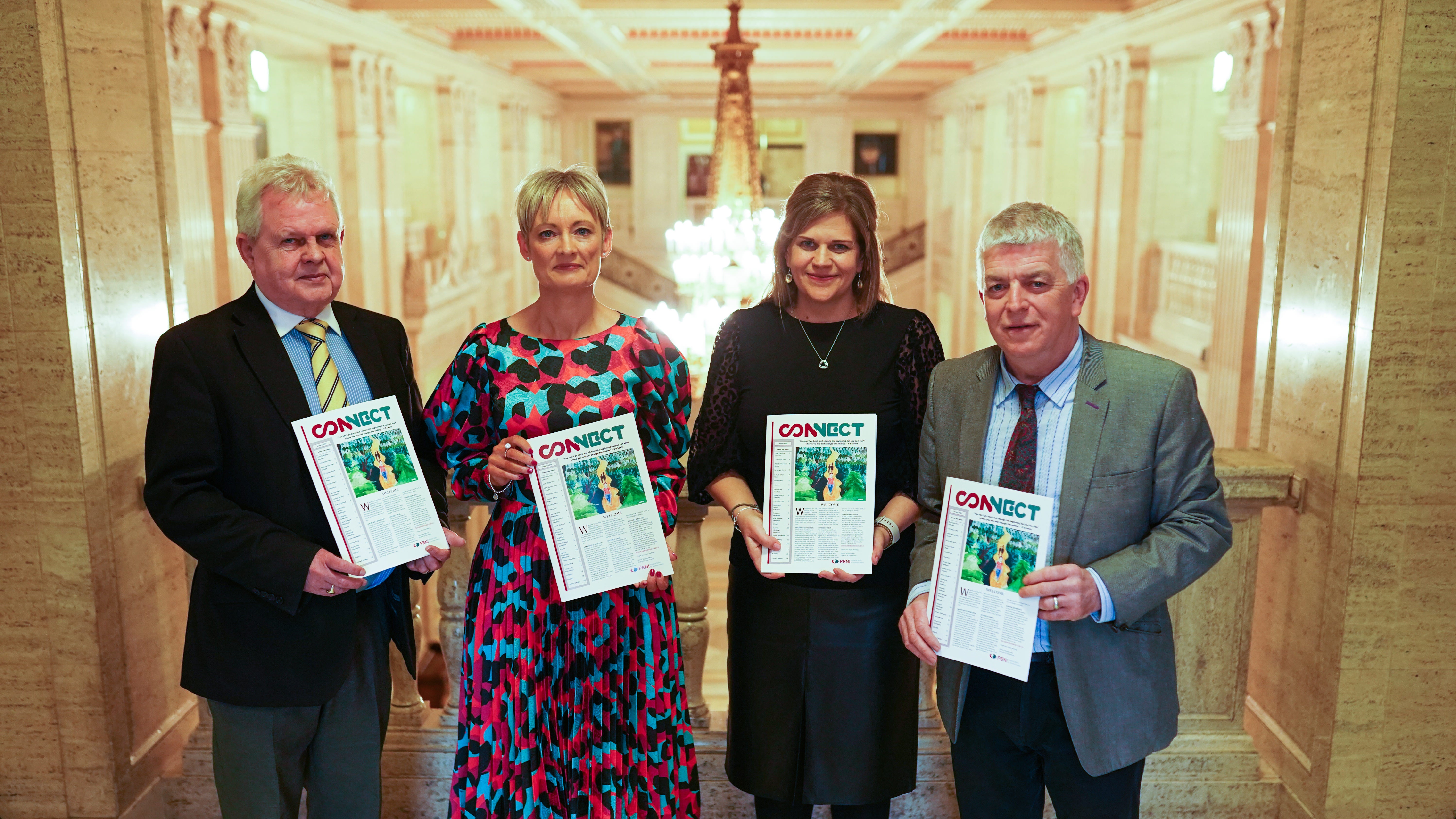 From left, Fred Caulfield, executive director of the Prison Arts Foundation, Amanda Stewart, PBNI chief executive, Gillian Montgomery, PBNI director of operations, and Professor Joe Duffy, senior social work lecturer at QUB, at the launch of the Connect newsletter at Stormont (PBNI/PA)