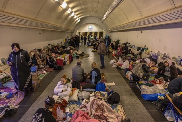 <p>People inside Dorohozhychi subway station in the Ukrainian capital of Kyiv which has been turned into a bomb shelter</p>
