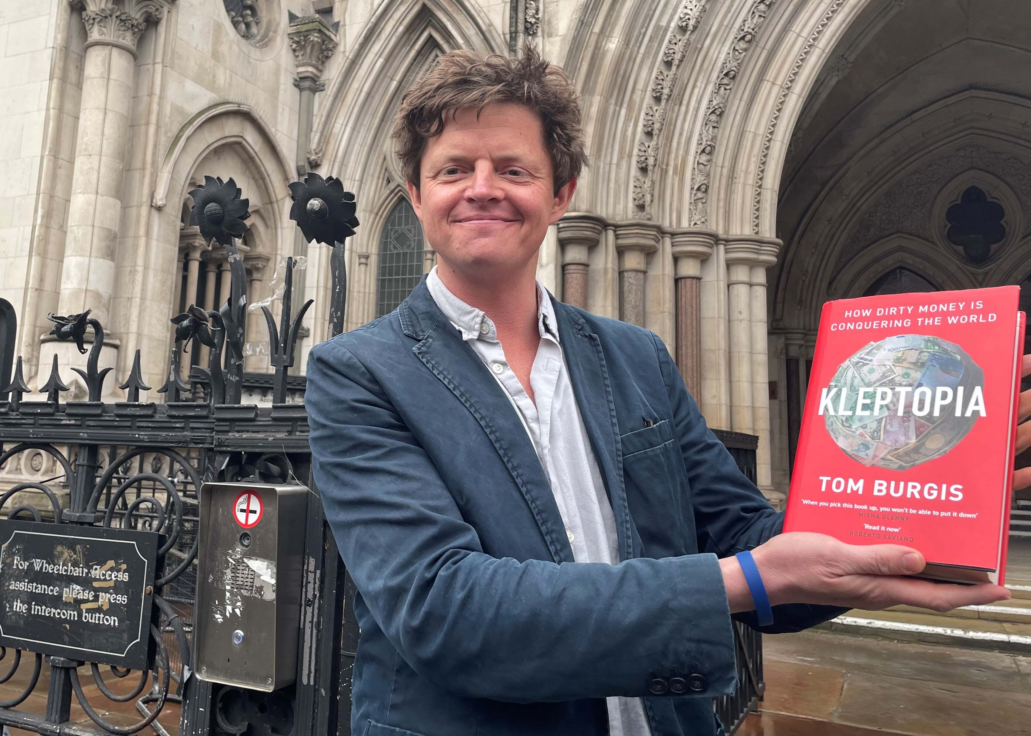 Tom Burgis outside of the Royal Courts of Justice in London after a high court judge dismissed a libel claim against him over his book, Kleptopia: How Dirty Money is Conquering the World. Eurasian Natural Resources Corporation (ENRC) sued the Financial Times journalist Tom Burgis over his book first published by Harper Collins in September 2020. Picture date: Wednesday March 2, 2022.