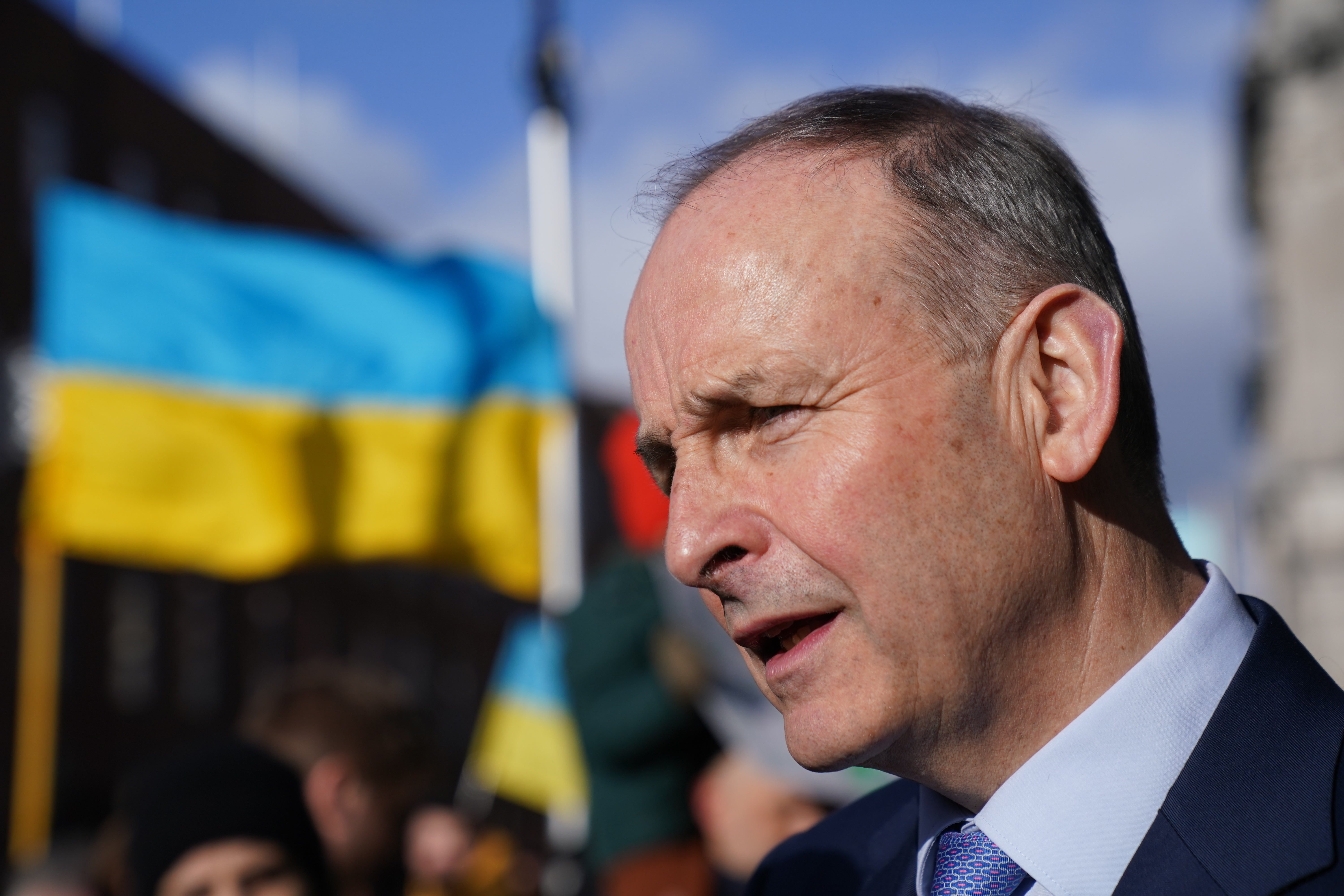 Taoiseach Micheal Martin meets people attending a demonstration outside Leinster House in Dublin to protest the Russian invasion of their country (Brian Lawless/PA)