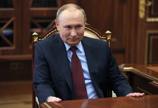 <p>Russian President Vladimir Putin attends a meeting with the head of Russia's Union of Industrialists and Entrepreneurs, a big business lobby group, at the Kremlin in Moscow on March 2, 2022.</p>