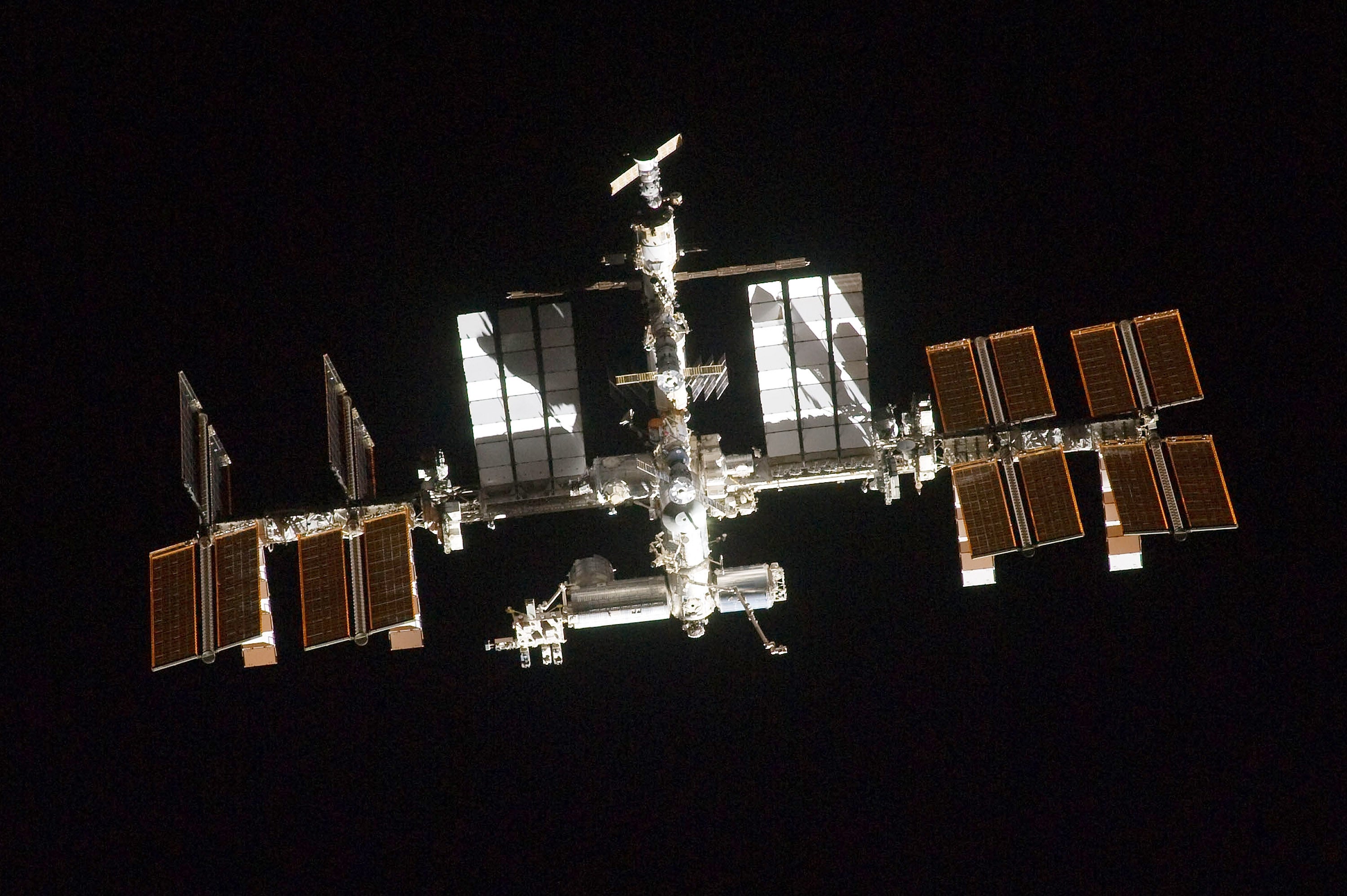 In this handout image provided by Nasa, the ISS photographed by a crew member onboard the space shuttle Atlantis