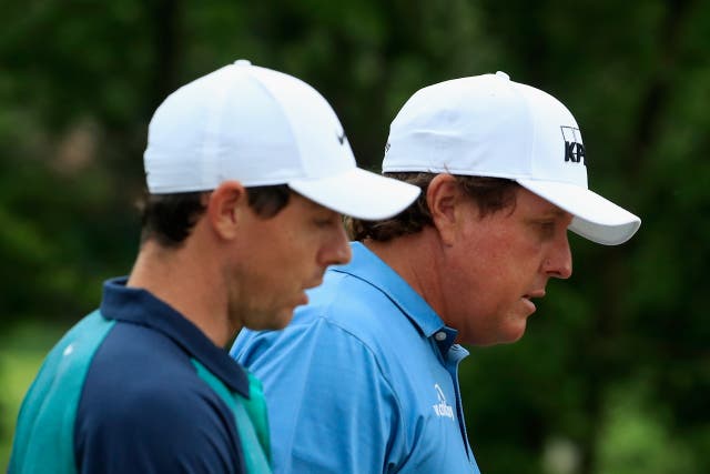 <p>Rory McIlroy (left) hopes that Phil Mickelson is soon back playing on tour </p>
