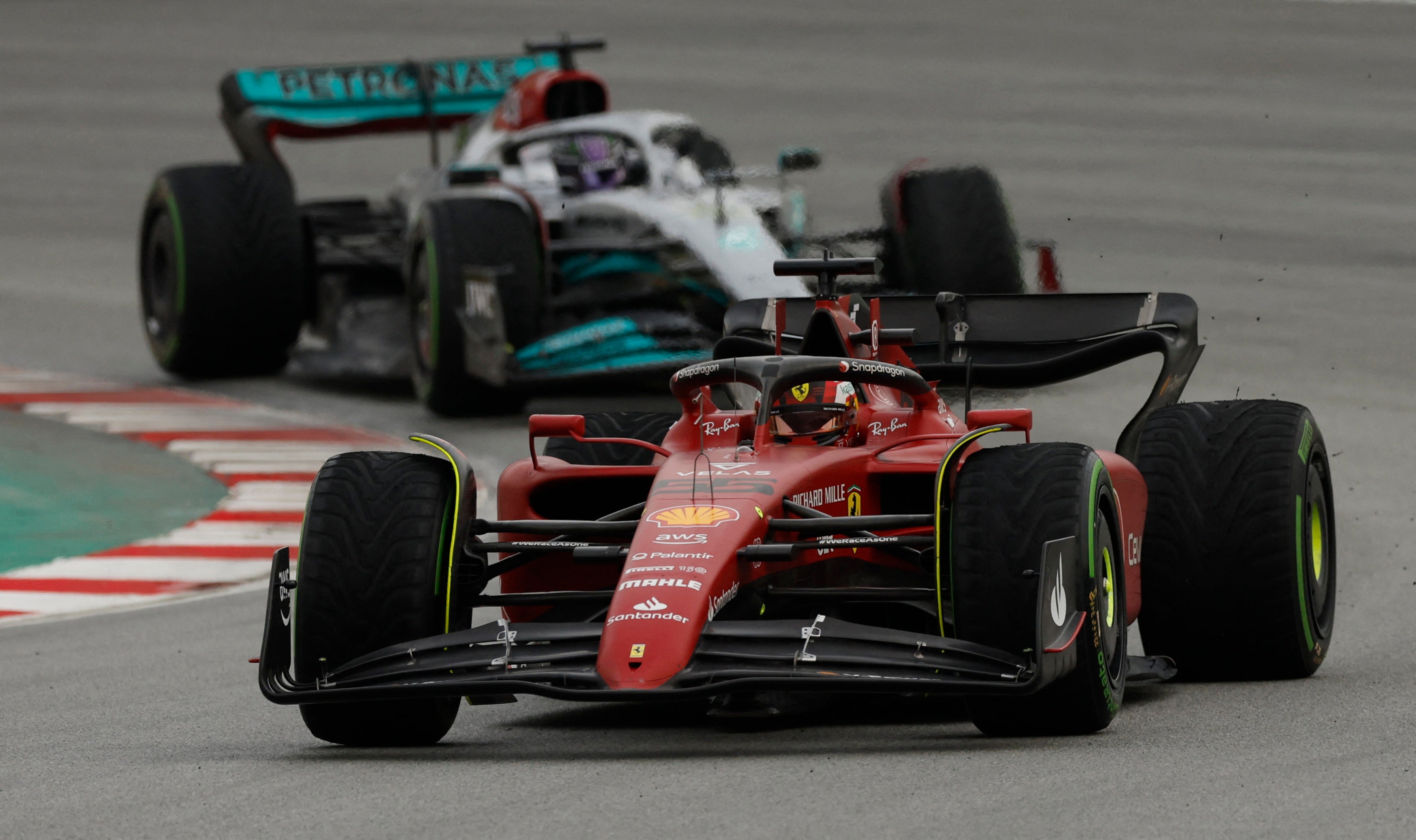 Carlos Sainz and Lewis Hamilton during testing