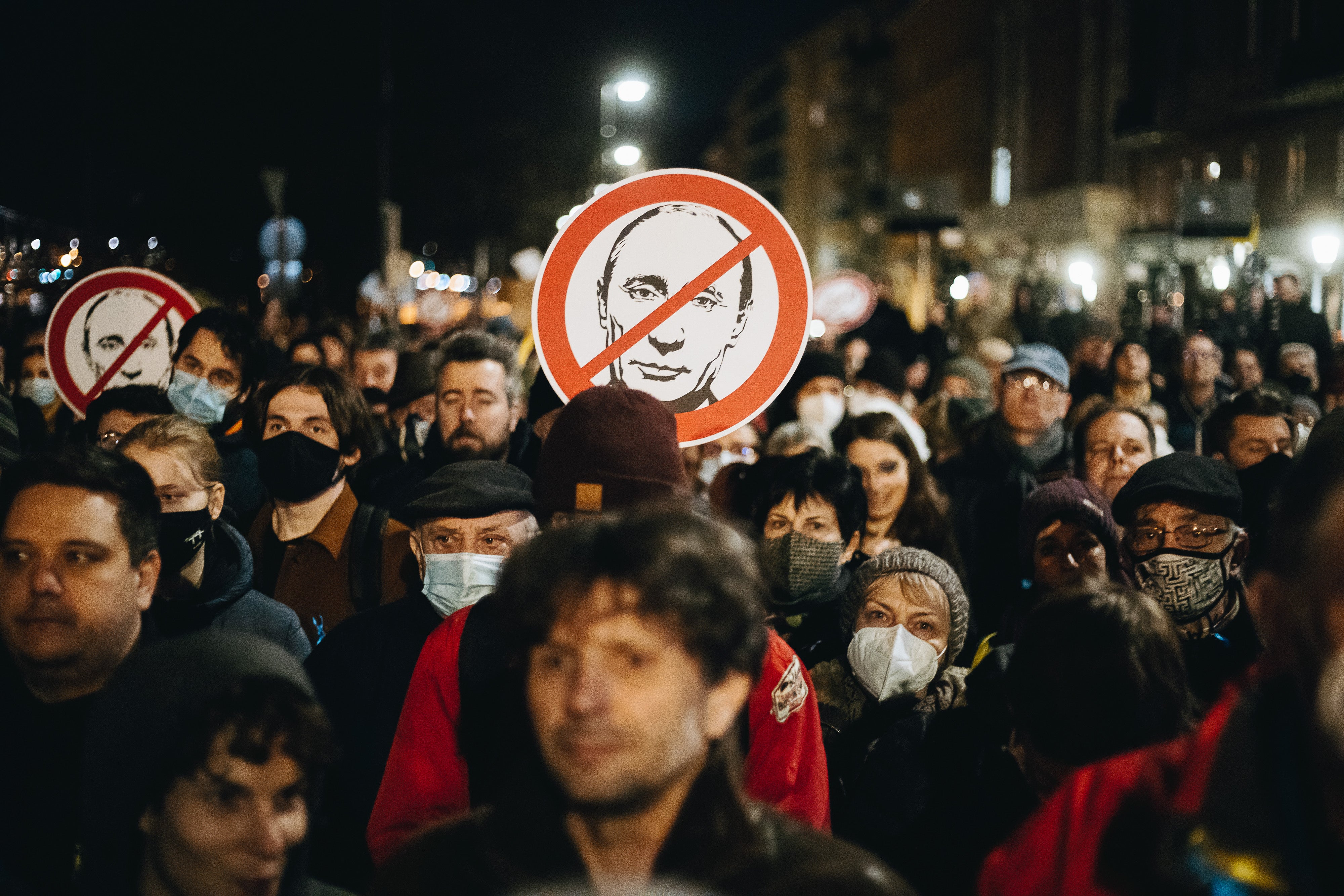 People attend an anti-Russia protest march organised by Hungary’s opposition coalition in Budapest, 1 March 2022