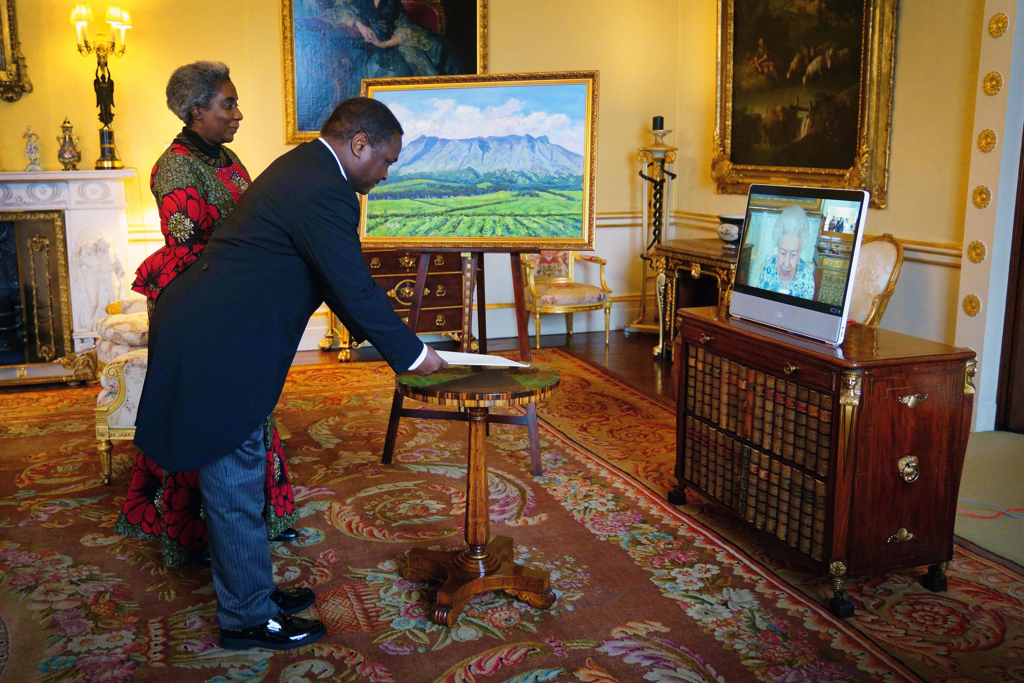 Malawi’s High Commissioner Thomas Bisika and his wife during the virtual audience with the Queen (Victoria Jones/PA)