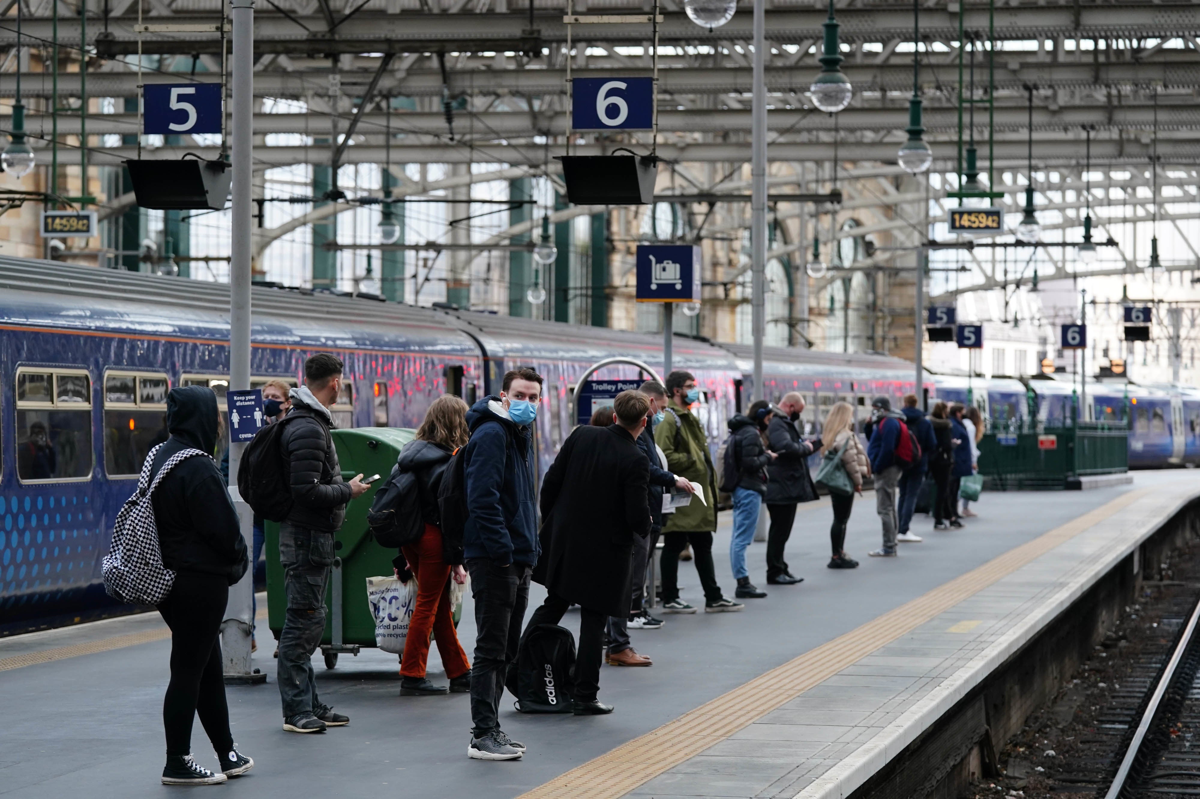 Scotland saw biggest rise in cases (Pictured: Passengers on platform at Glasgow central station last month)