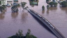Australia floods: Residents and horses trapped overnight on bridge in New South Wales