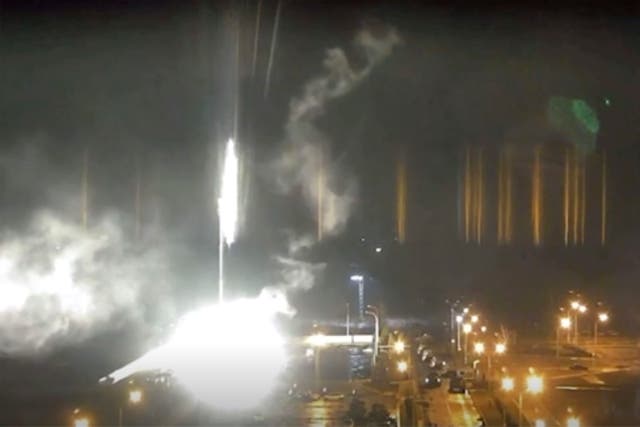 <p>This image made from a video released by Zaporizhzhia nuclear power plant shows bright flaring object landing in grounds of the nuclear plant in Enerhodar, Ukraine Friday, 4 March 2022 </p>