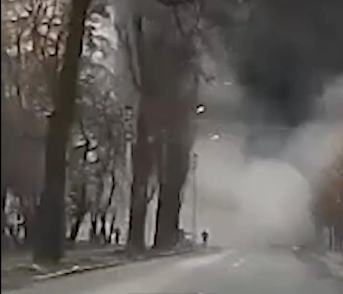 People can be seen running away from the missile attack on a residential area