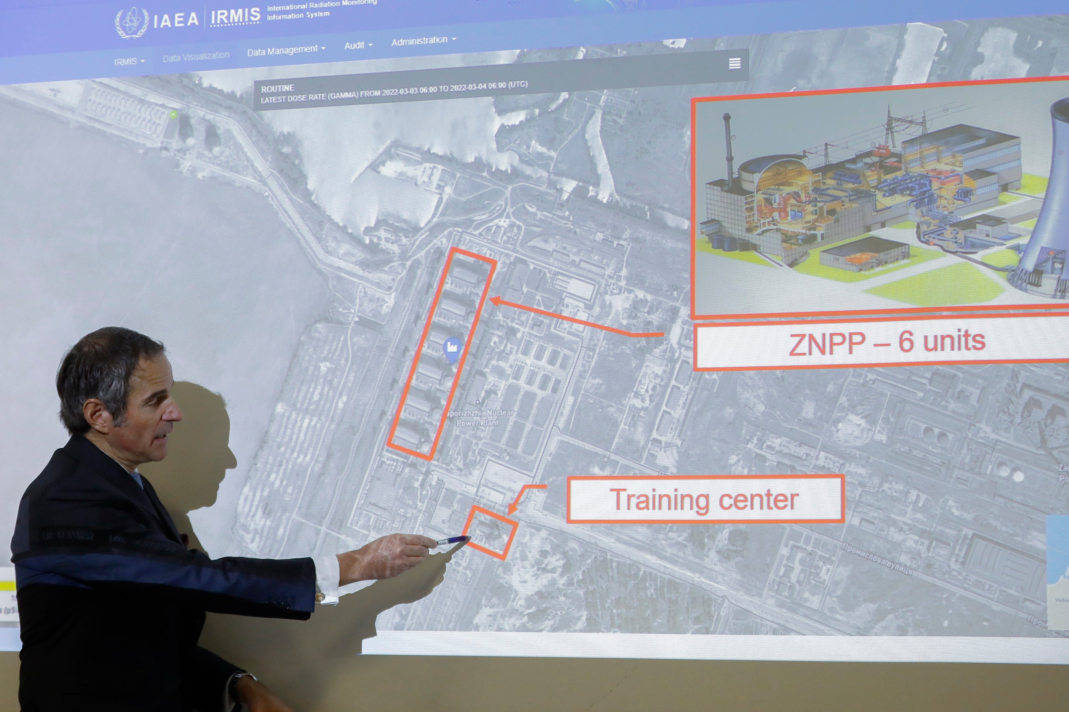 IAEA director-general Rafael Mariano Grossi points out where the damage was caused at the Zaporizhzhia nuclear power plant (Lisa Leutner/AP)