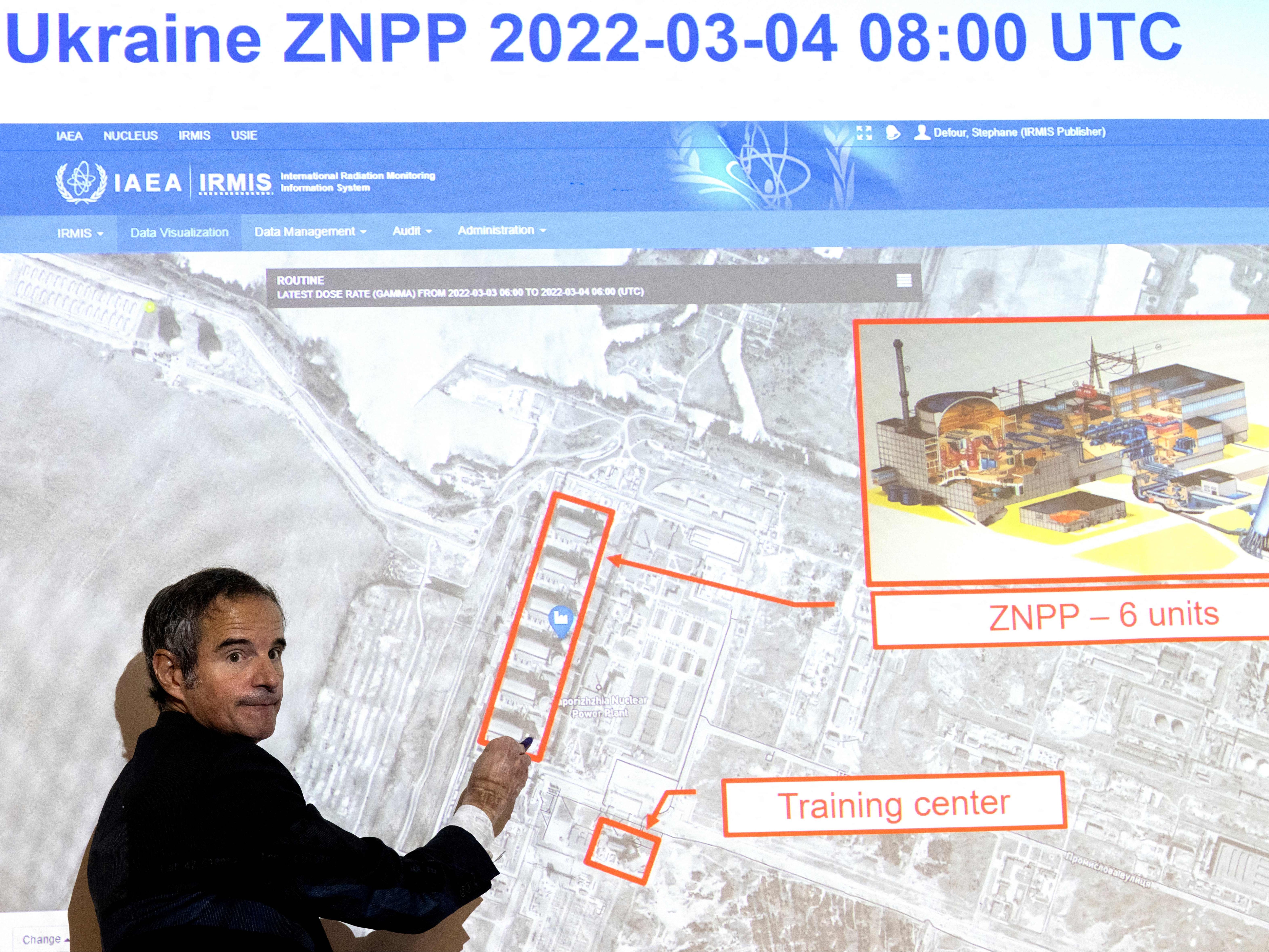 Rafael Grossi points on a map of the Zaporizhzhia nuclear power plant