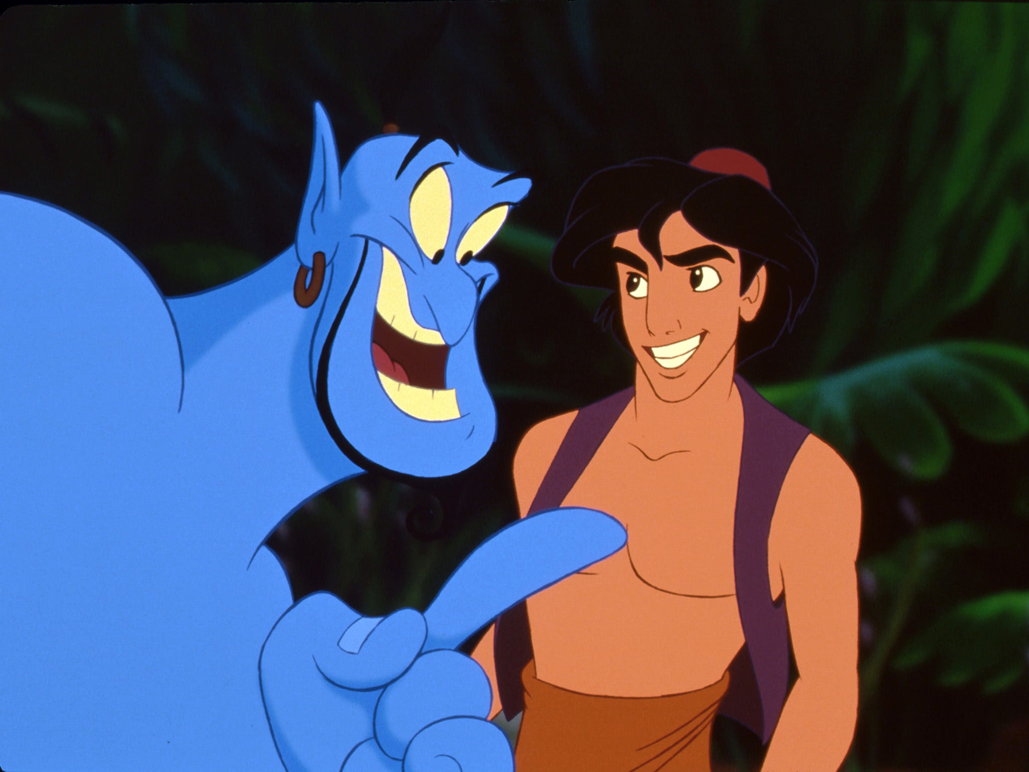 Robin Williams (à esquerda) como o Gênio em 'Aladdin'