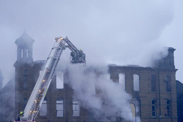 Firefighters tacking a blaze at Dalton Mills, Keighley, which used as a filming location for Peaky Blinders and Downton Abbey (Danny Lawson/PA)