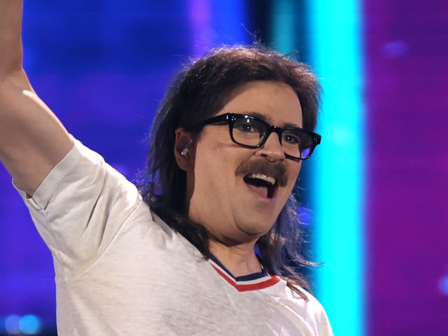 <p>Weezer star Rivers Cuomo performing onstage at the 2021 iHeartRadio festival</p>