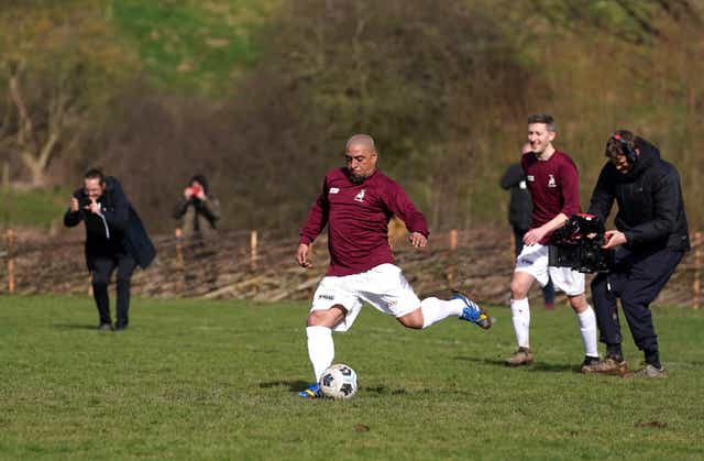 Roberto Carlos scores a penalty for Bull In The Barne United (Nick Potts/PA).