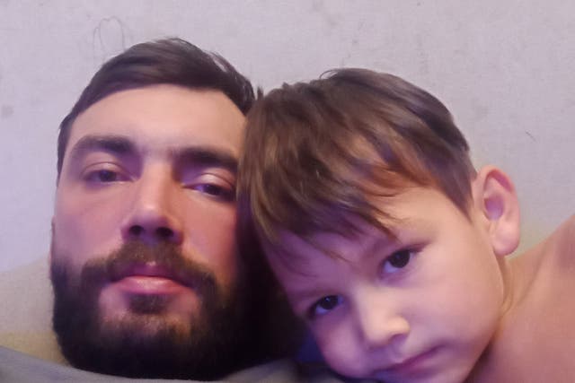 <p>Five-year-old Semyon (R) has died after he and his family, including his father Anton (L) were shot by Russian forces. </p>