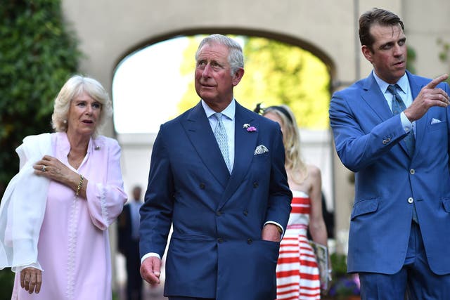 (Left – right) The Duchess of Cornwall, Prince of Wales and Ben Elliot attend a reception in support of the Elephant Family at Lancaster House (Ben Stansall/PA)