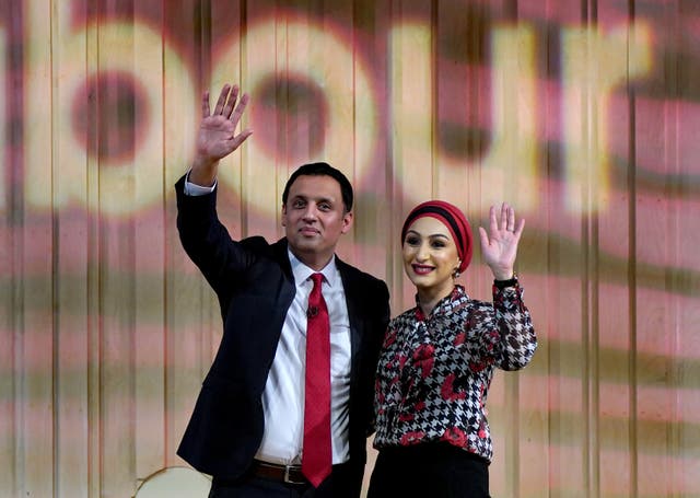 Scottish Labour leader Anas Sarwar with his wife Farheen after speaking during the Scottish Labour conference (Andrew Milligan/PA)