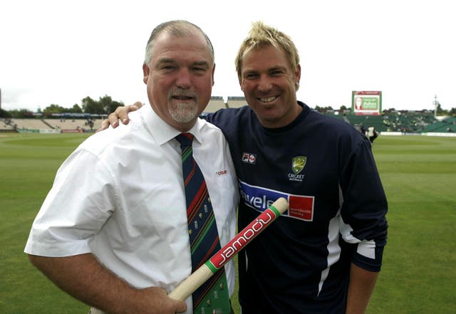 Mike Gatting with Shane Warne after he reached 600 Test wickets during the 2005 Ashes (Phil Noble/PA)