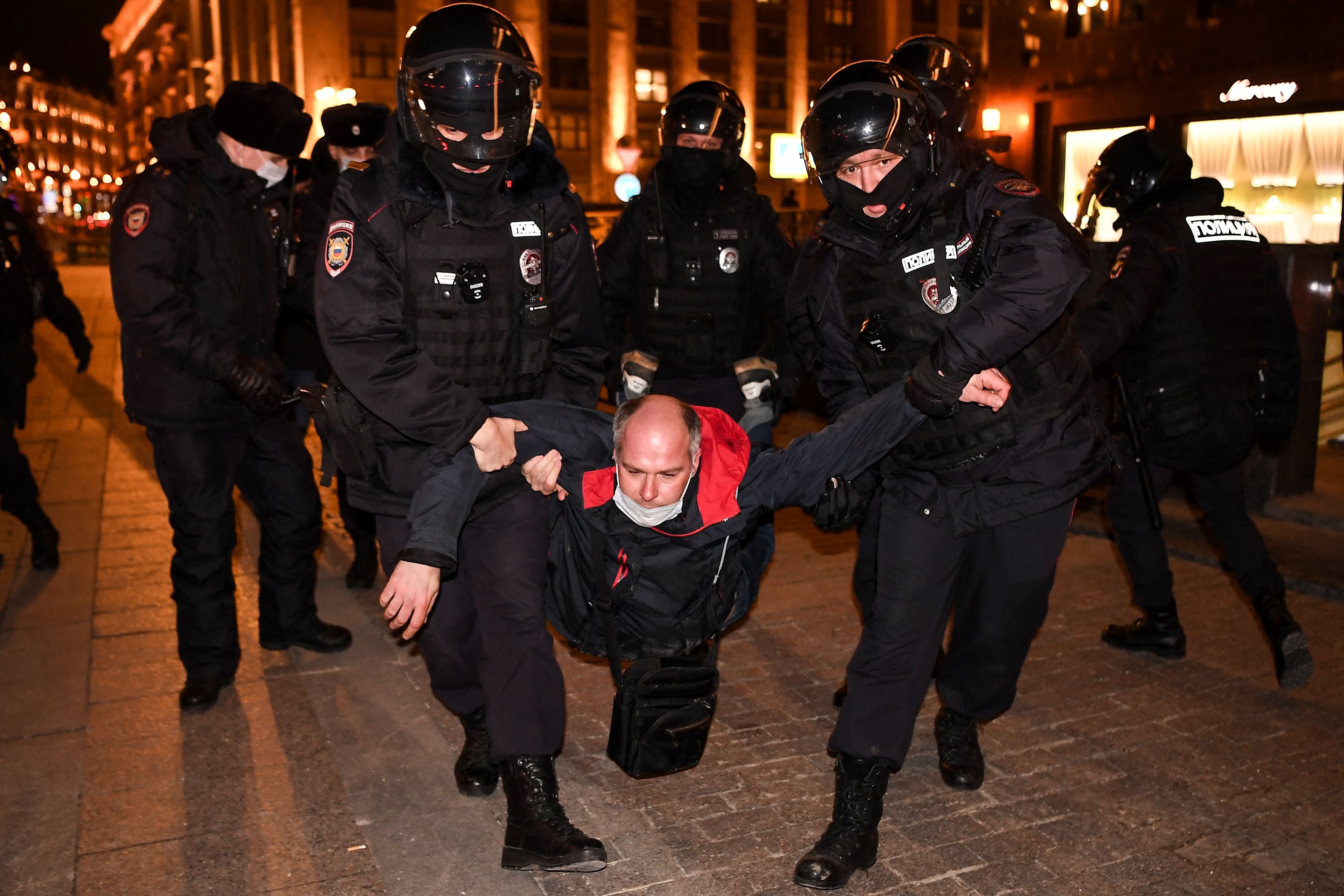 Police officers detain a man during a protest against Russia’s invasion of Ukraine in central Moscow, 3 March 2022