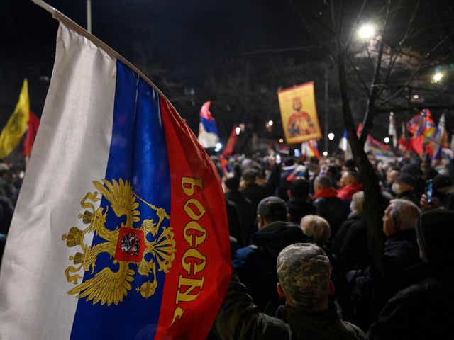 <p>People wave Russian and Serbian flags during a rally organised by Serbian right-wing organisations in support of Russian invasion in Ukraine, in Belgrade earlier this month </p>